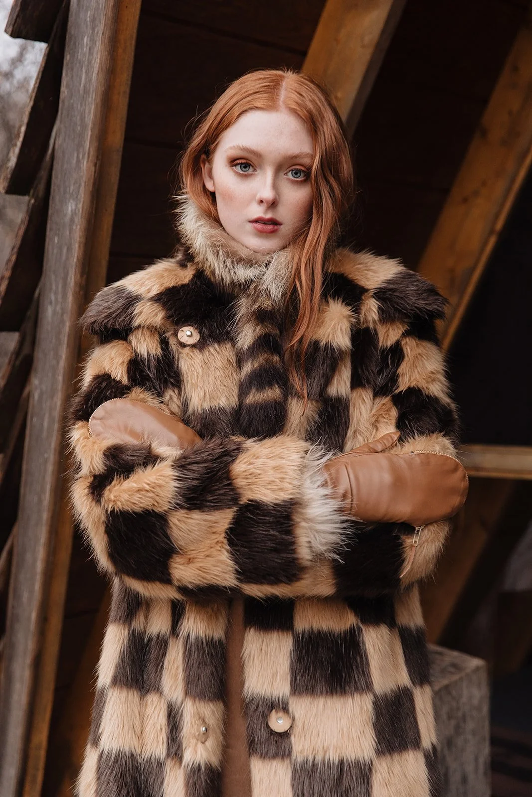 Editorial fashion portrait woman in leopard print faux fur coat natural light studio photography by Bekah Wriedt