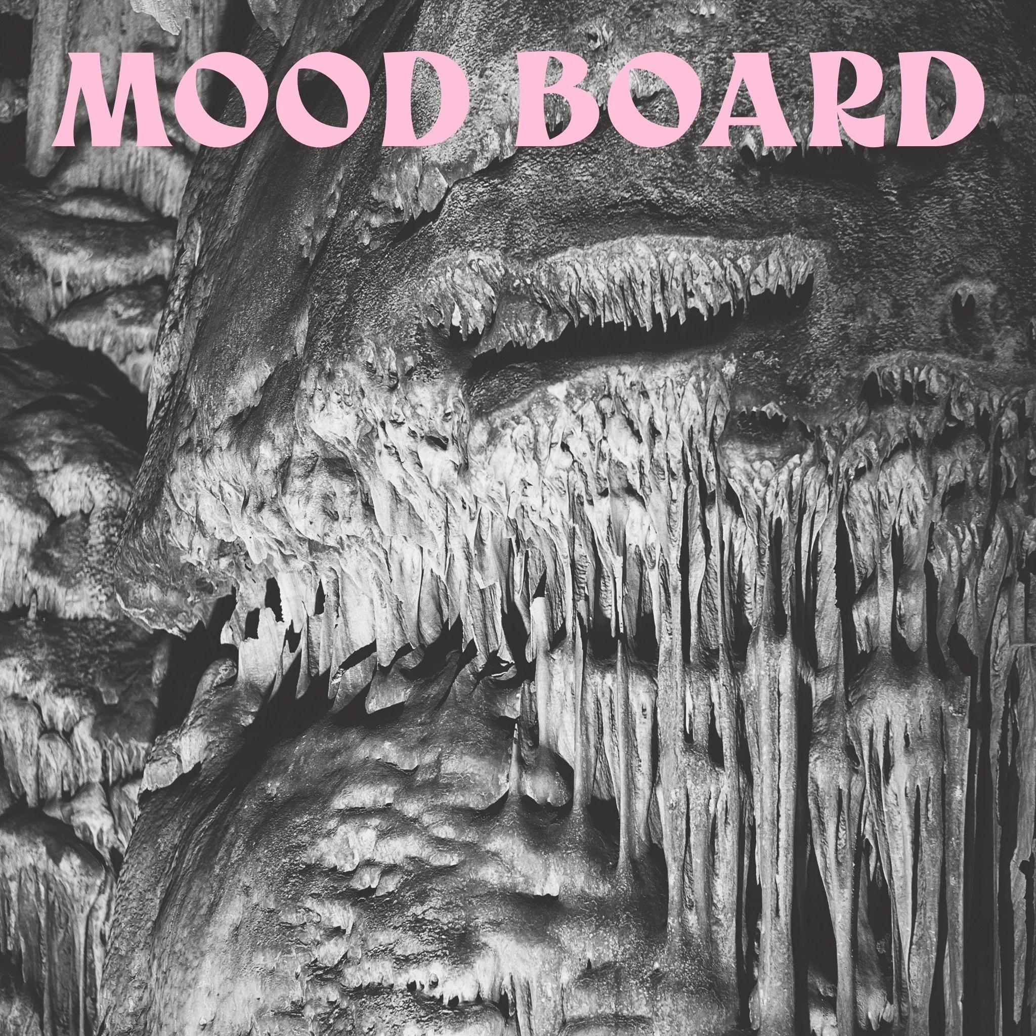An image of a black and white cave is overlaid with the words: Mood Board.