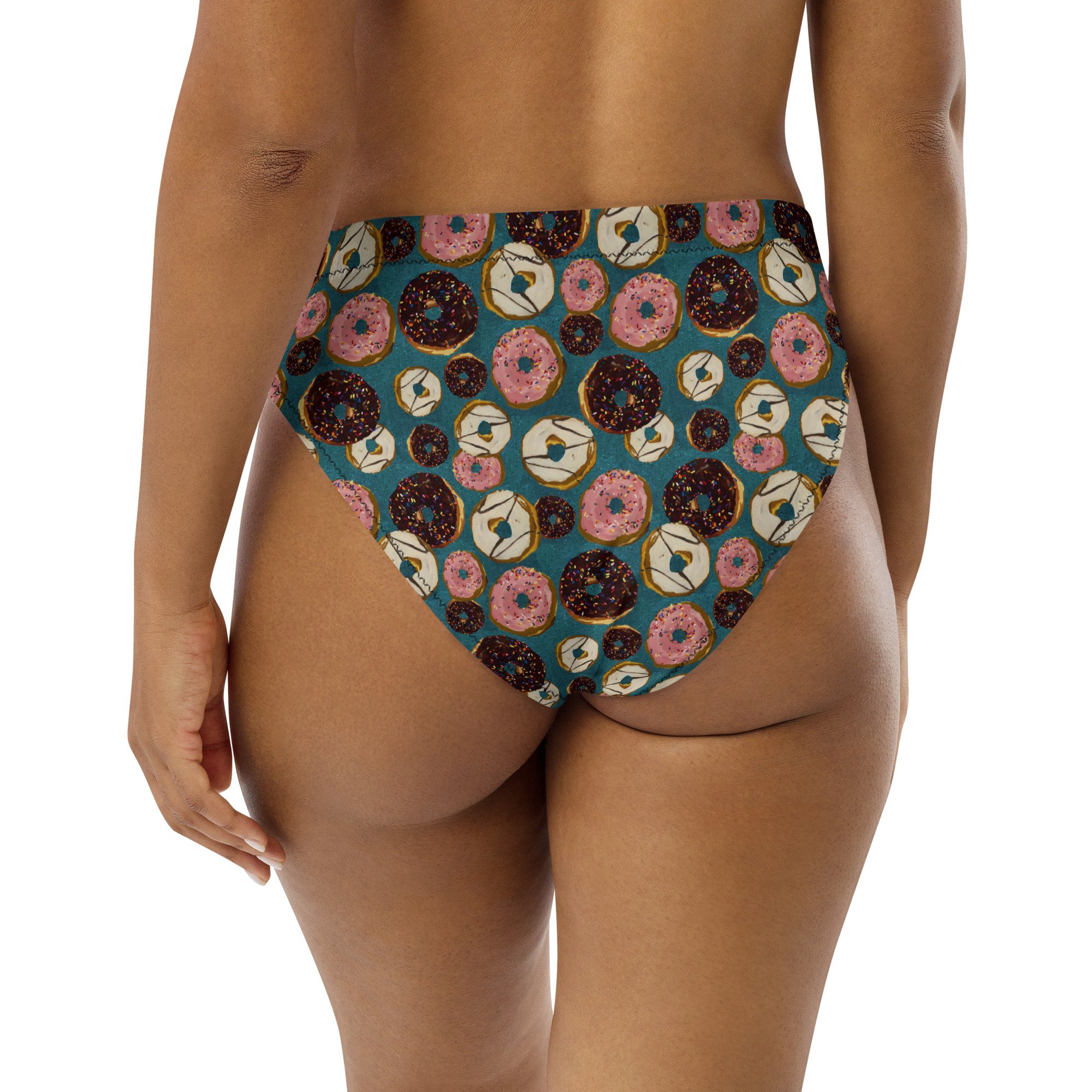 Donuts with rainbow sprinkles print by Kibby & Co. from original paintings. Teal, glitter effect background. Chocolate, Strawberry, Vanilla frosted doughnuts. Bathing suit bottom back on model