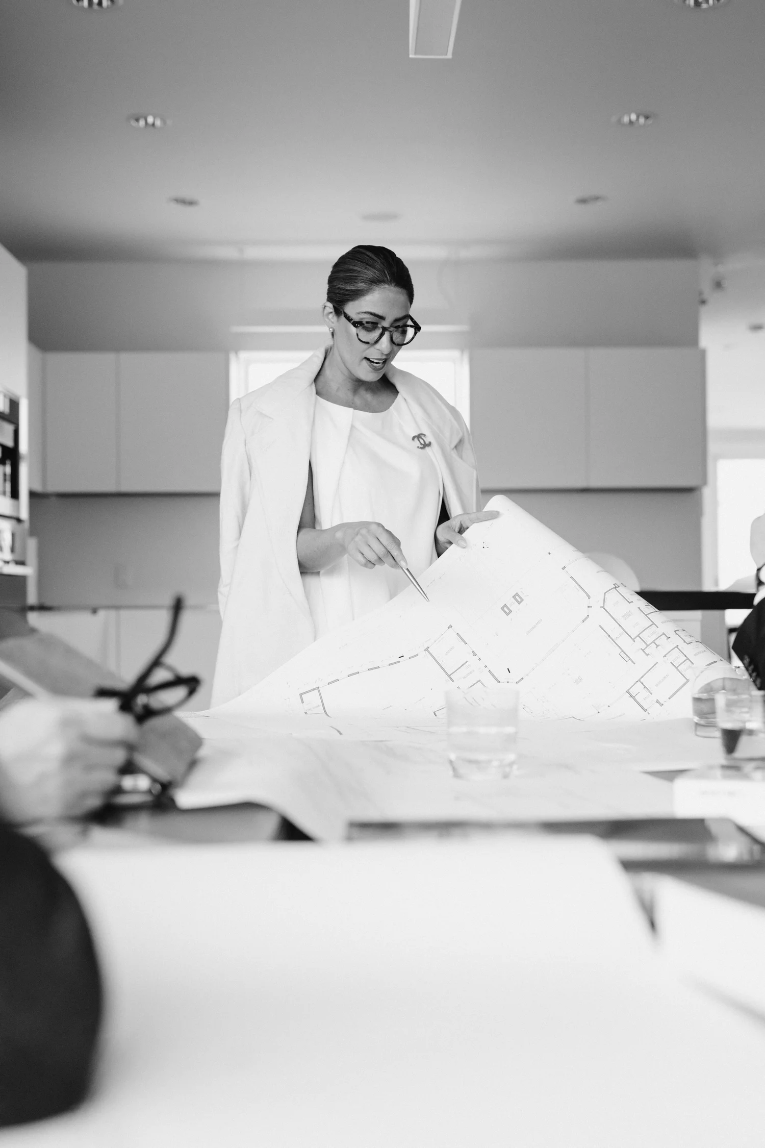 Interior design meeting with plans and material review