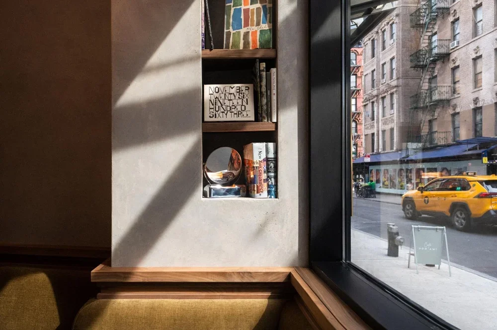 people watching at hole in the wall lower east side