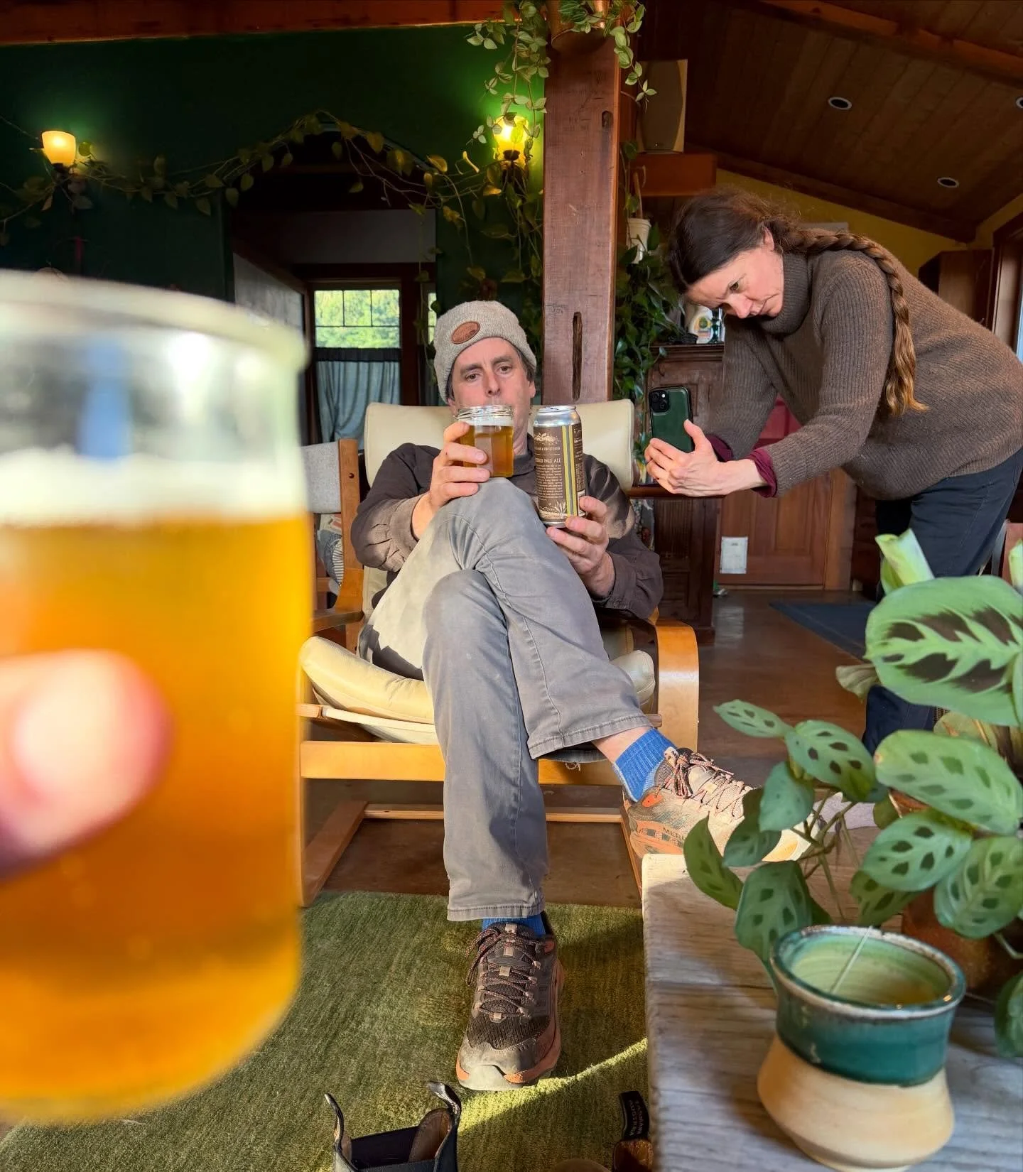Modern moment with old school village scale beer! My friend taking a picture of her beer while I take a picture of Keith and his beer😆. Threshold Pale Ale by Chimacum Valley Brewery, with organic barley we grow here in the valley, and then floor mal
