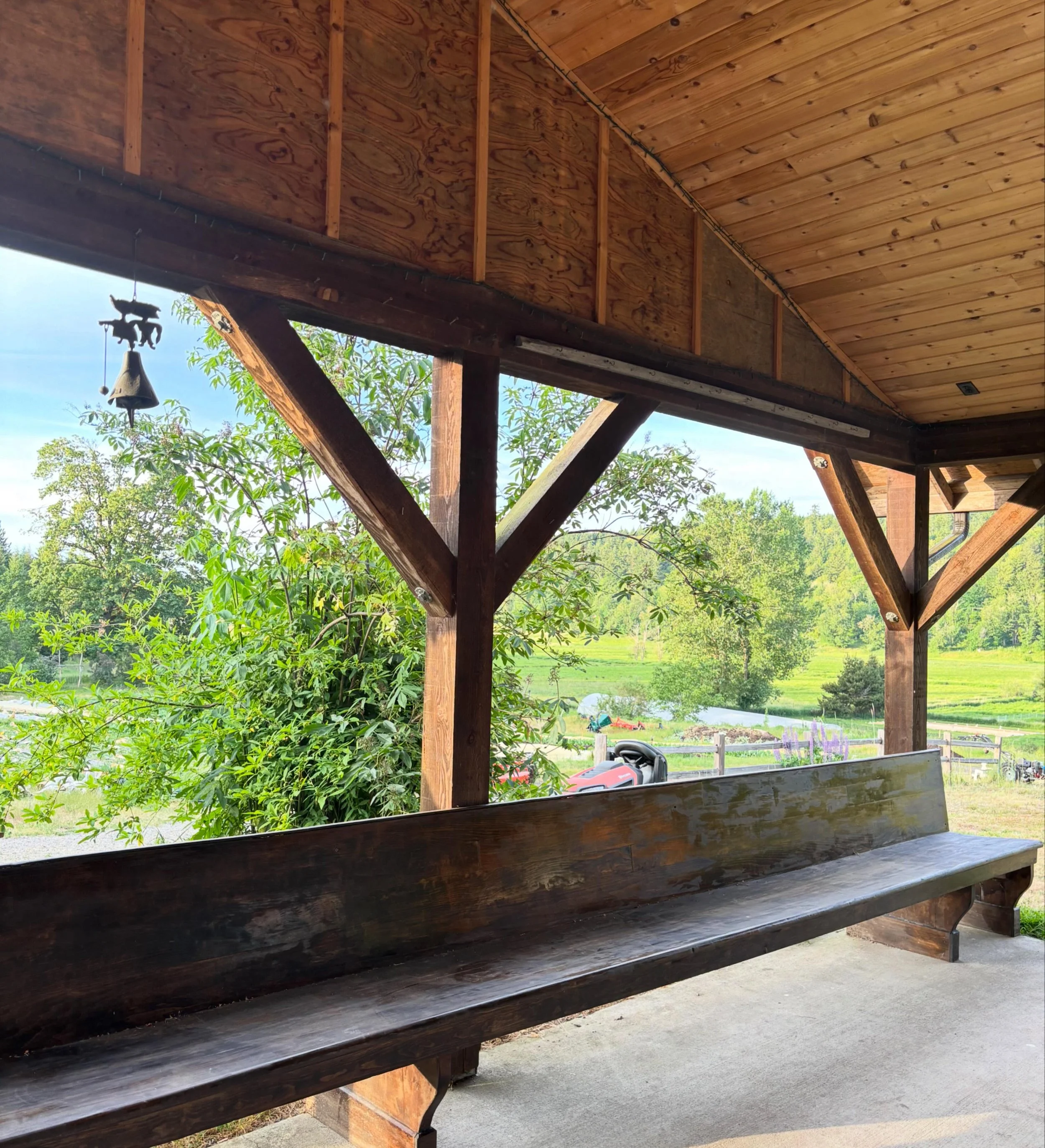 View in the bakery pavilion&hellip; Somewhere along the way we were gifted this old church pew (does anyone remember where it came from?) and it&rsquo;s been providing scenic seating here for many years. Just got out the oil to give it a good conditi