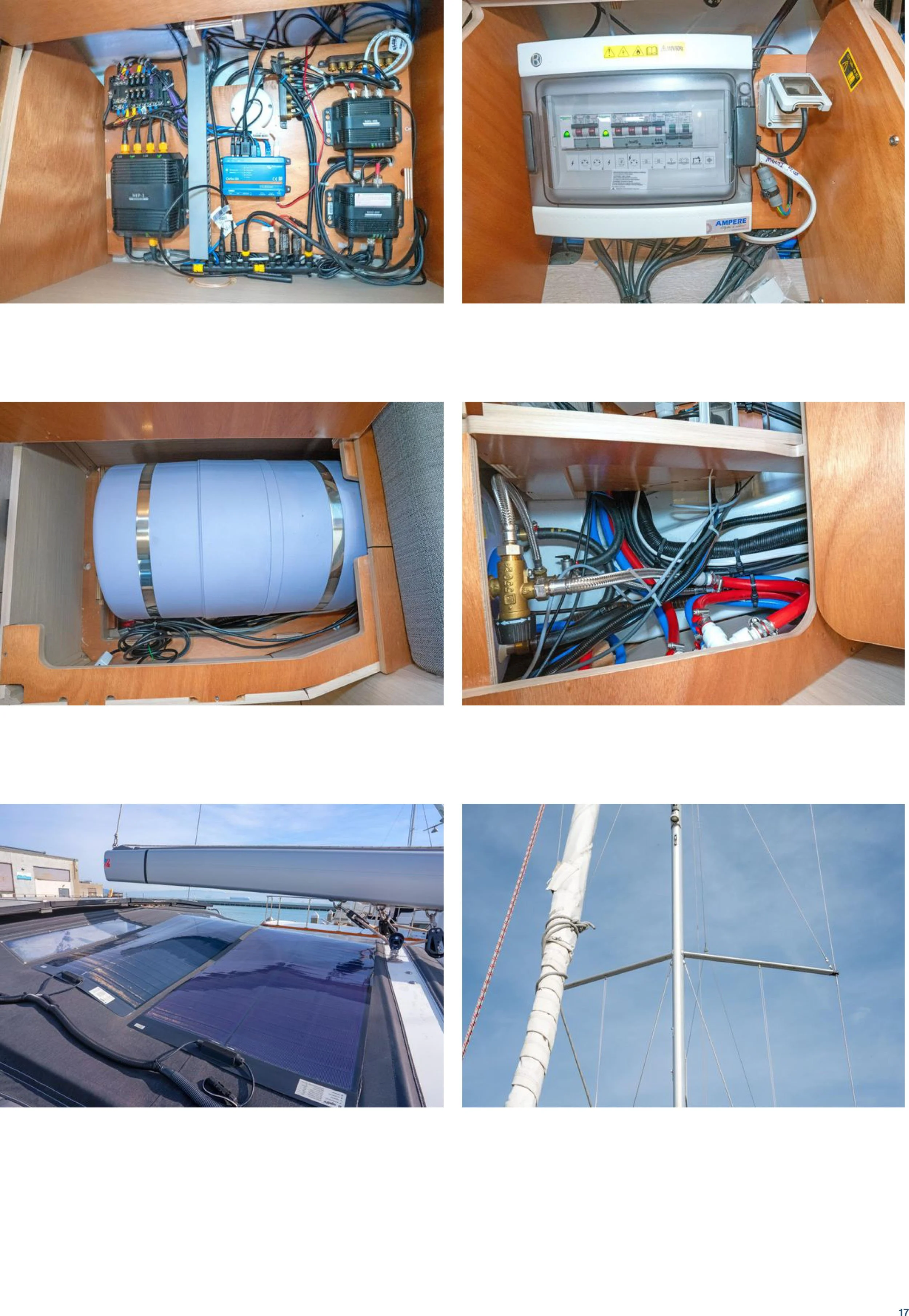 Inside a boat, various electrical and electronic systems including batteries, a power distribution panel, a solar panel, and a mast with rigging.