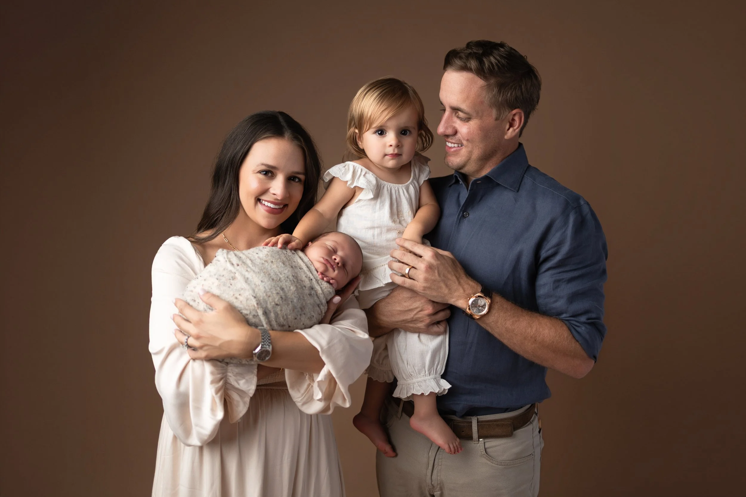 Luxury newborn and family photography in Dahlonega GA, creating timeless studio portraits for families throughout Alpharetta, Milton and North Georgia.