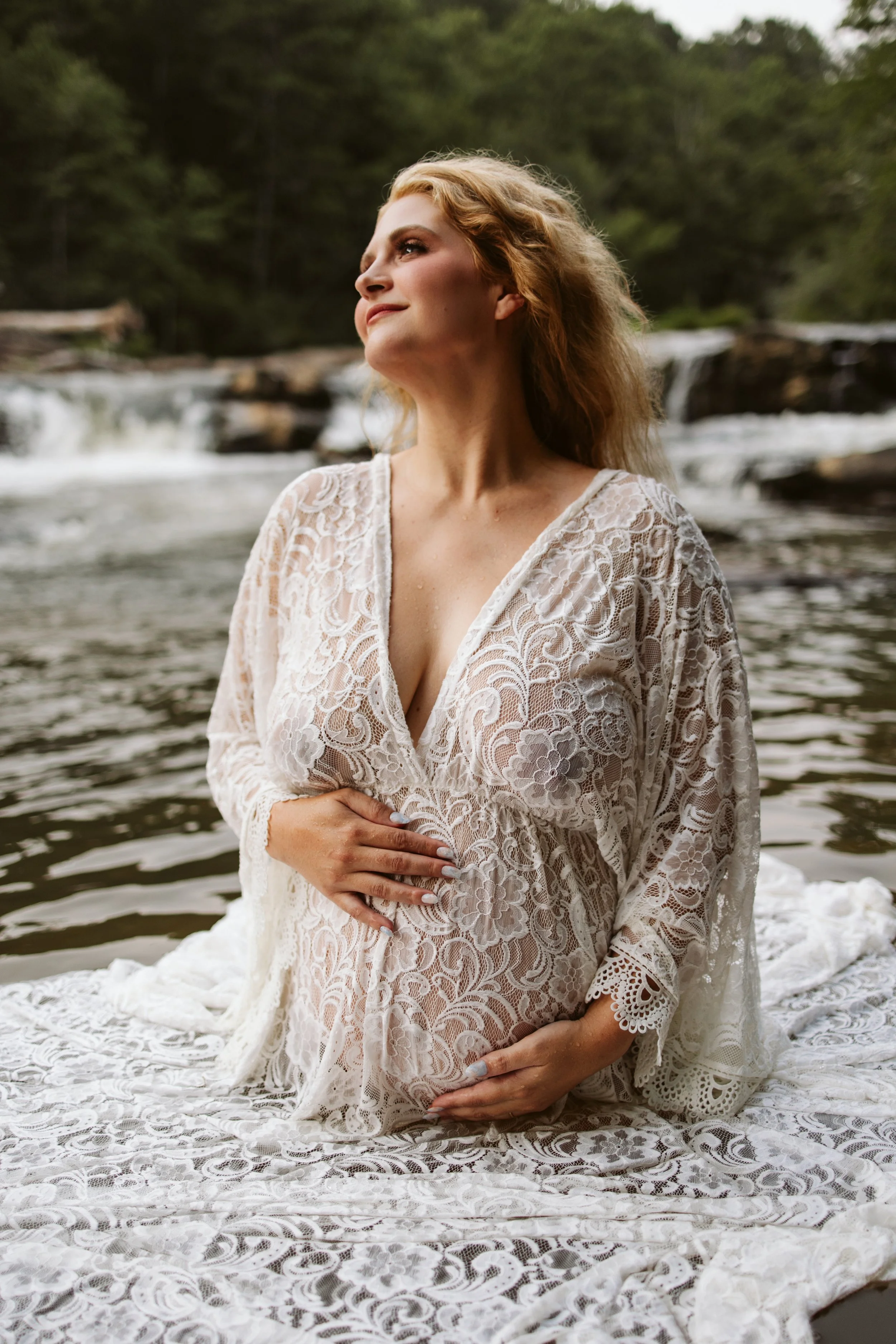 Luxury maternity photography at a North Georgia waterfall near Dahlonega, serving maternity clients from Alpharetta, Milton, Cumming and Atlanta GA.