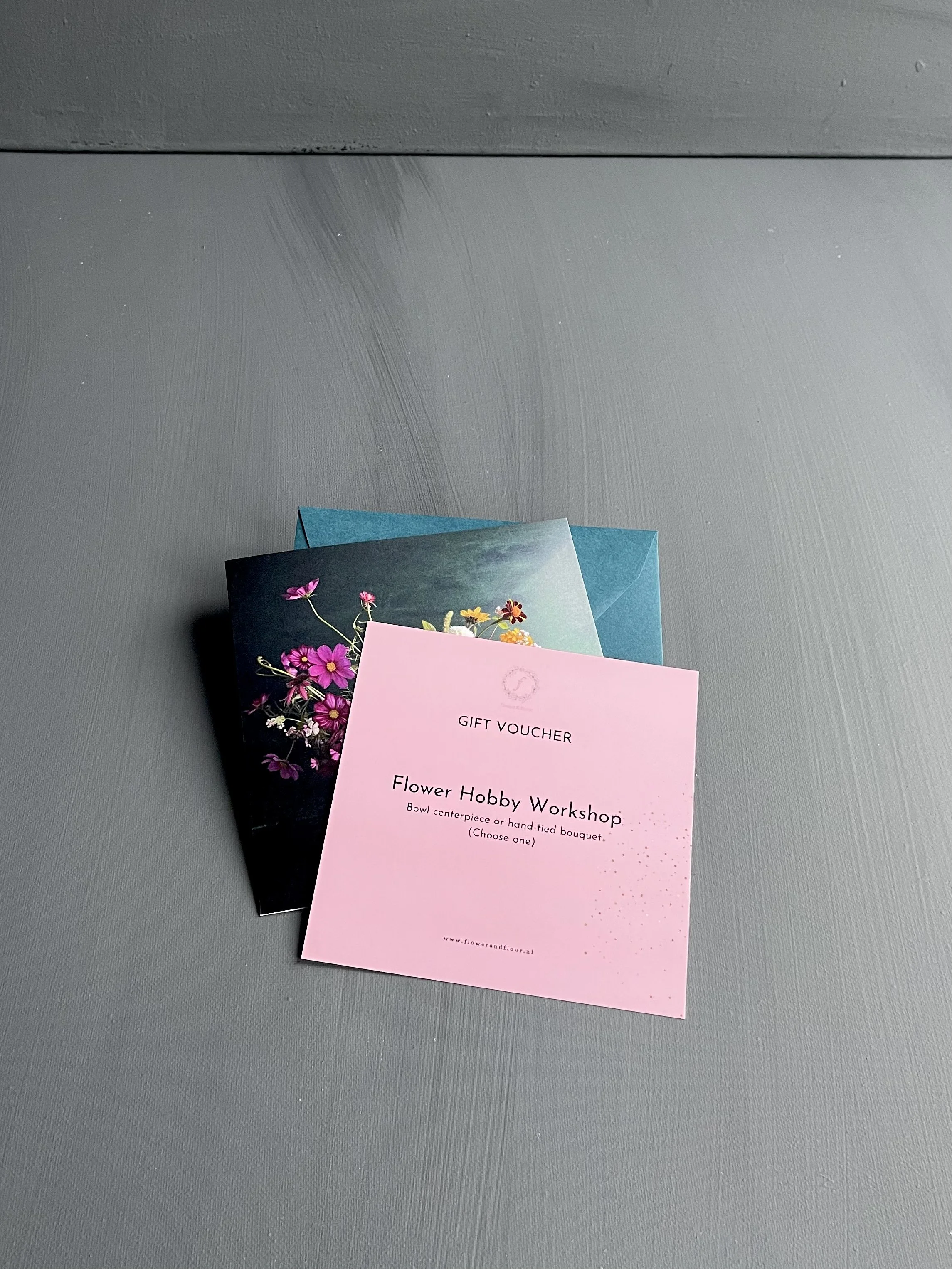 card, envelope and a voucher