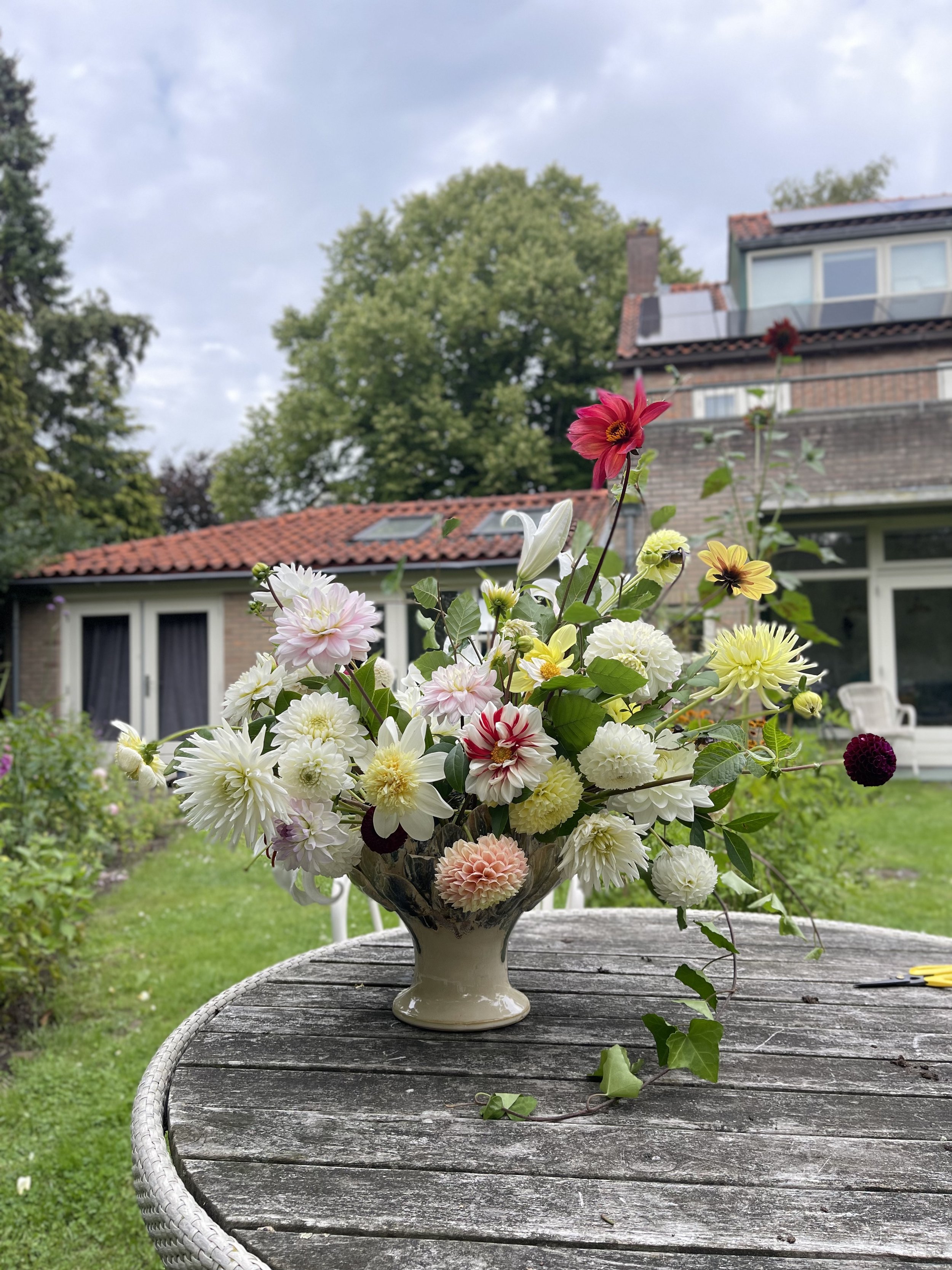 Flower workshop participant arranging