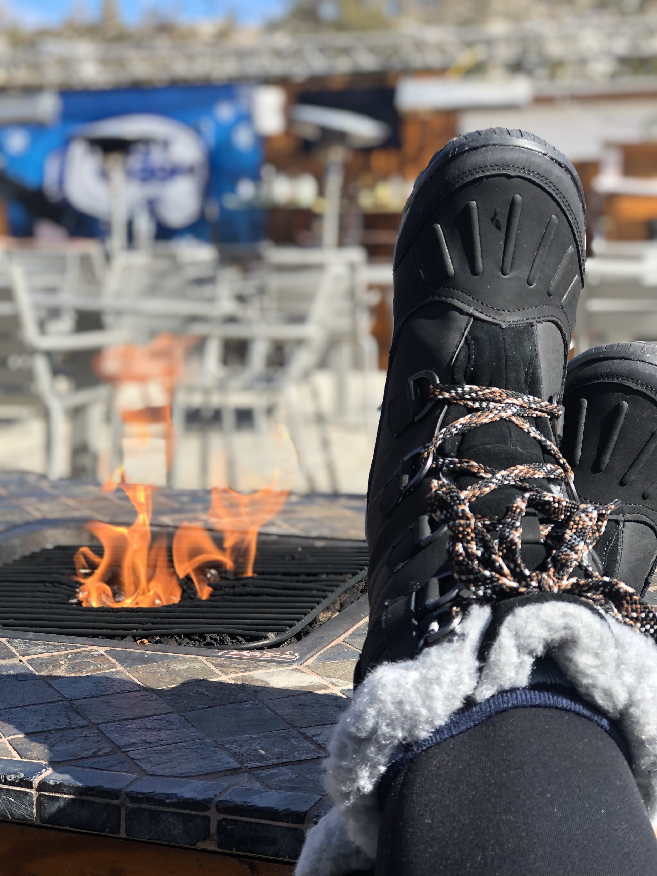 Winter Boots Around a Fire