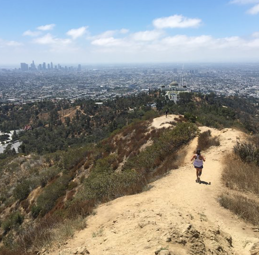 Woman Trail Running at the Hollywood Sign Hike