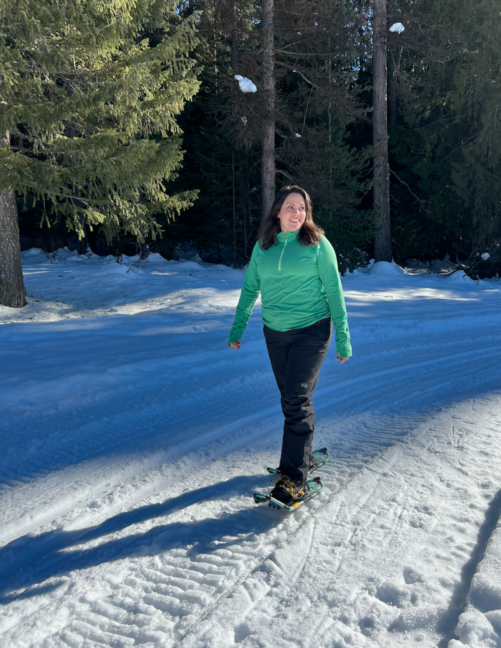 Woman Snowshoeing in North Idaho