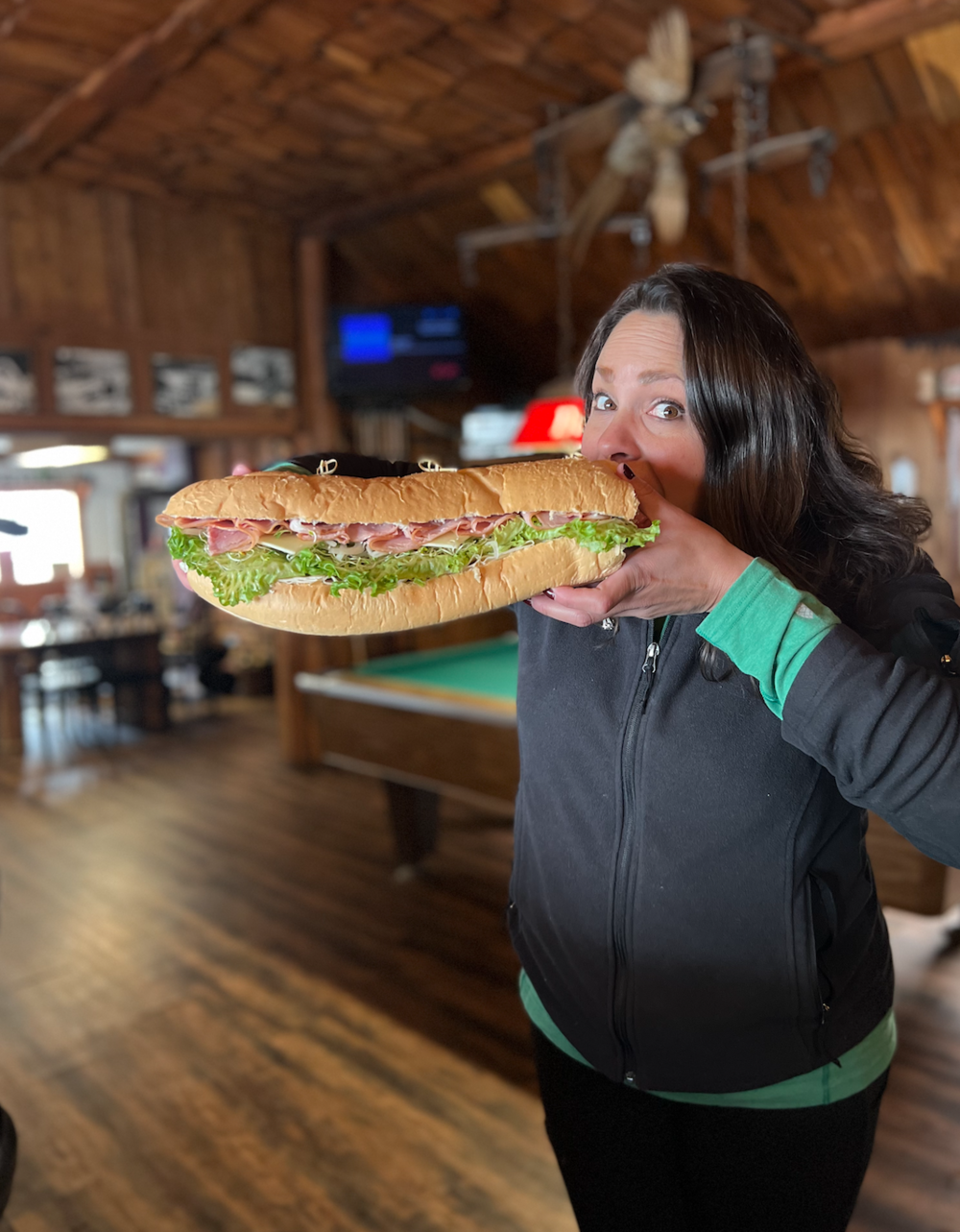 Woman Eating Gigantic Sandwich 