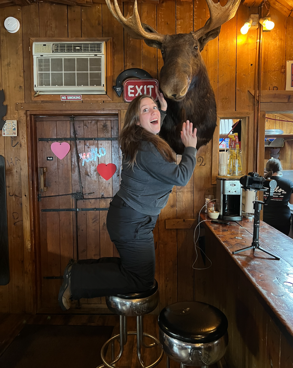 Woman Posing with Moose Head