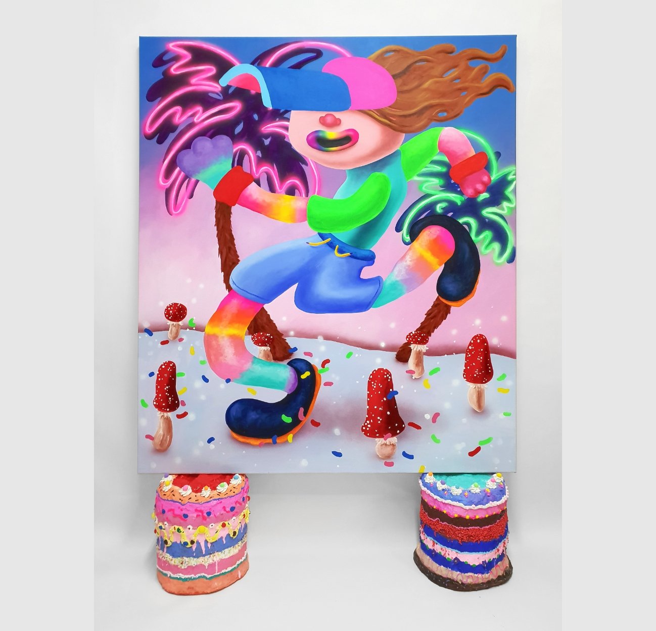 Don't care Bear; acrylic and airbrush on 150 x 130cm canvas, resting on 2 cakes, each ca 34 x 32cm, acrylic, glitter, polystyrene beads, foamclay and resin on hardcoated PU, 2019