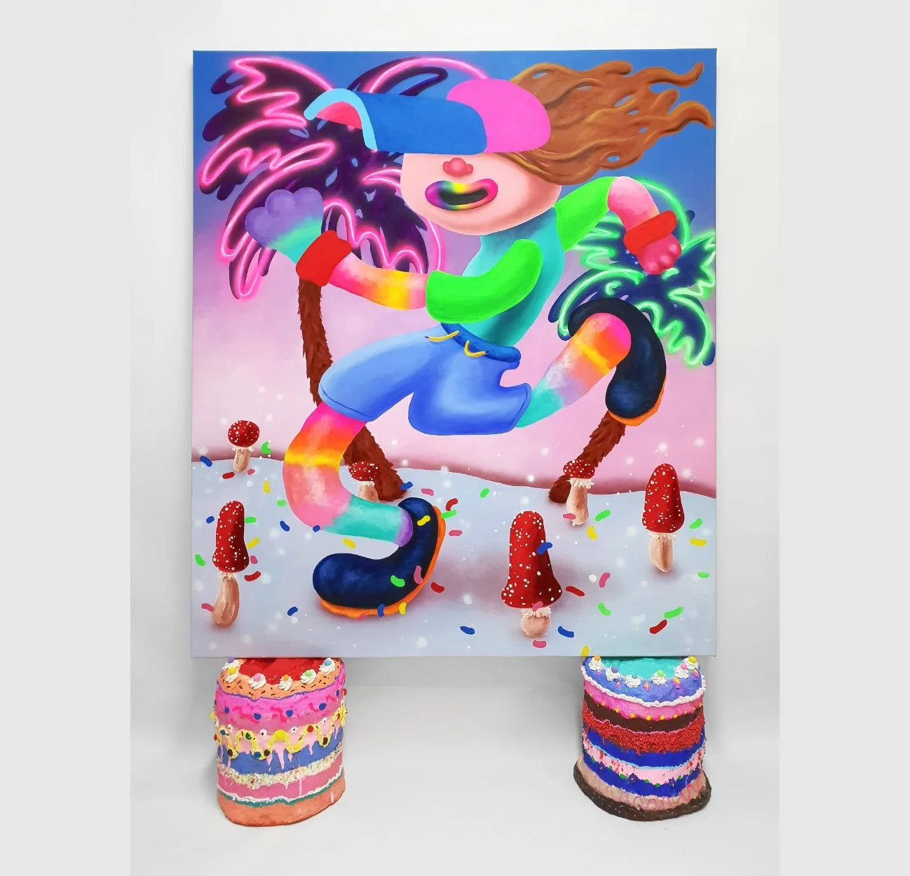 Don't care Bear; 2019, acrylic and airbrush on 150 x 130cm canvas, resting on 2 cakes, each ca 34 x 32cm, acrylic, glitter, polystyrene beads, foamclay and resin on hardcoated PU