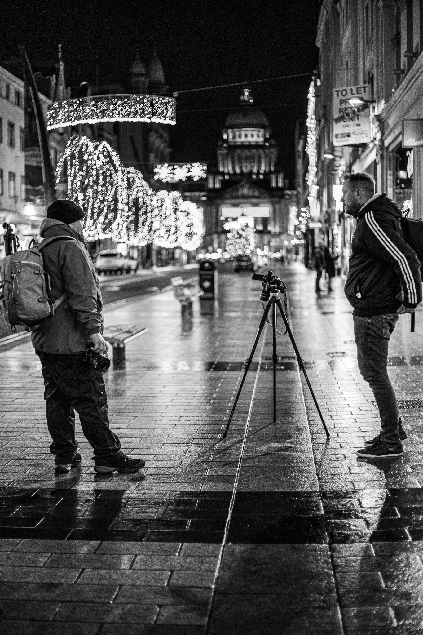 Photographers in Belfast city centre at Christmas time