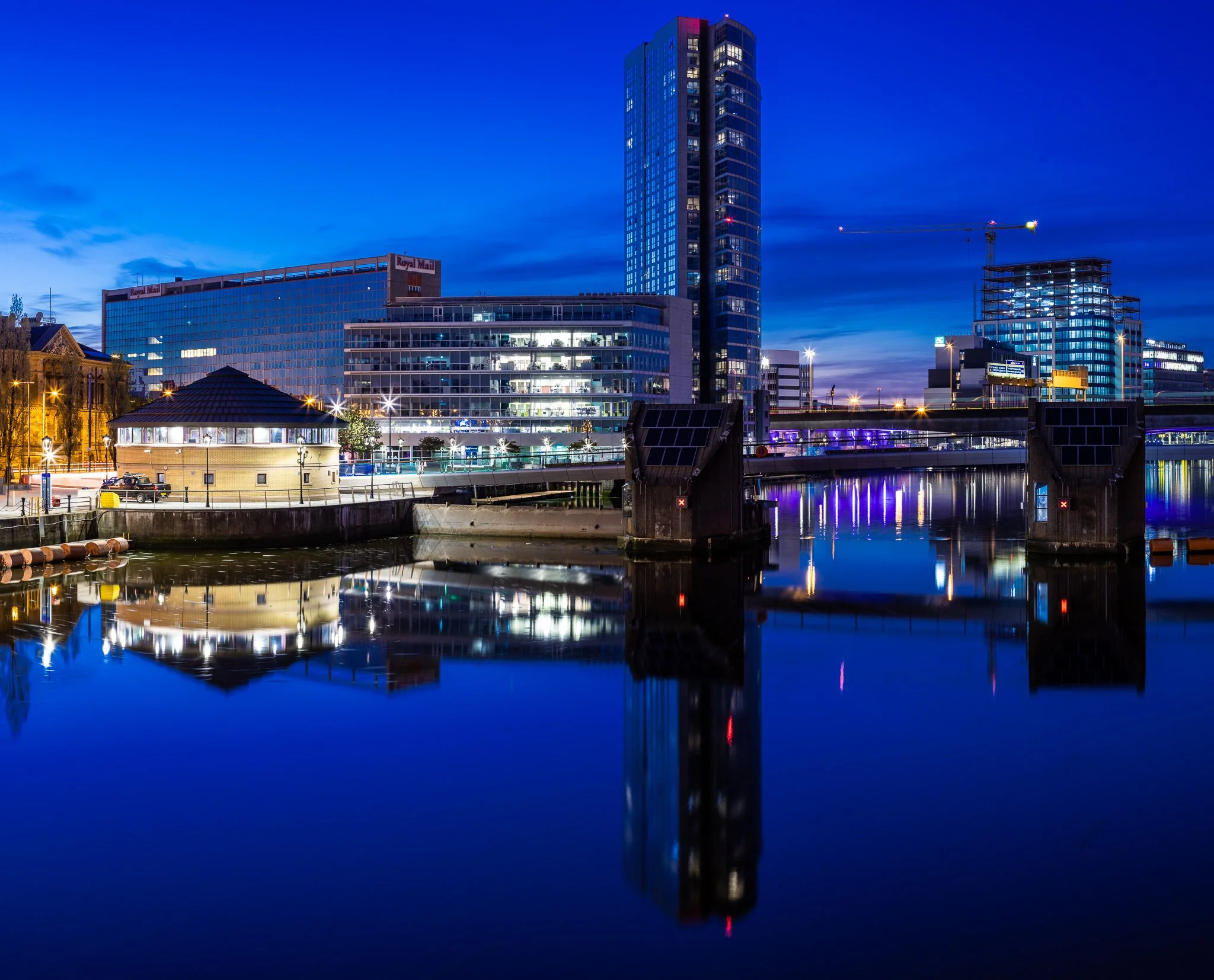 Obel tower, Titanic Quarter, Belfast. River Lagan reflection