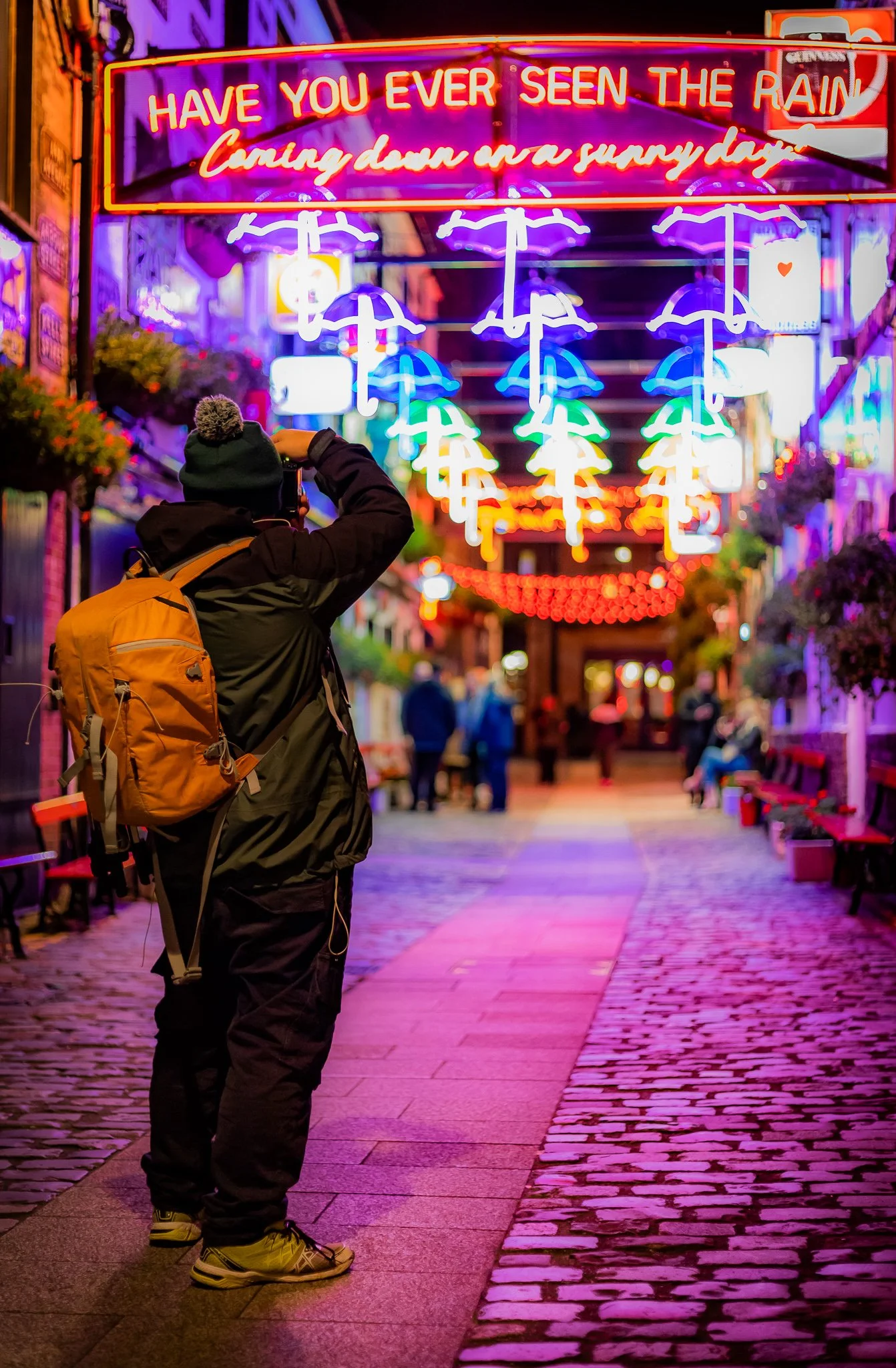 Photographer at Commercial Court, Belfast at night