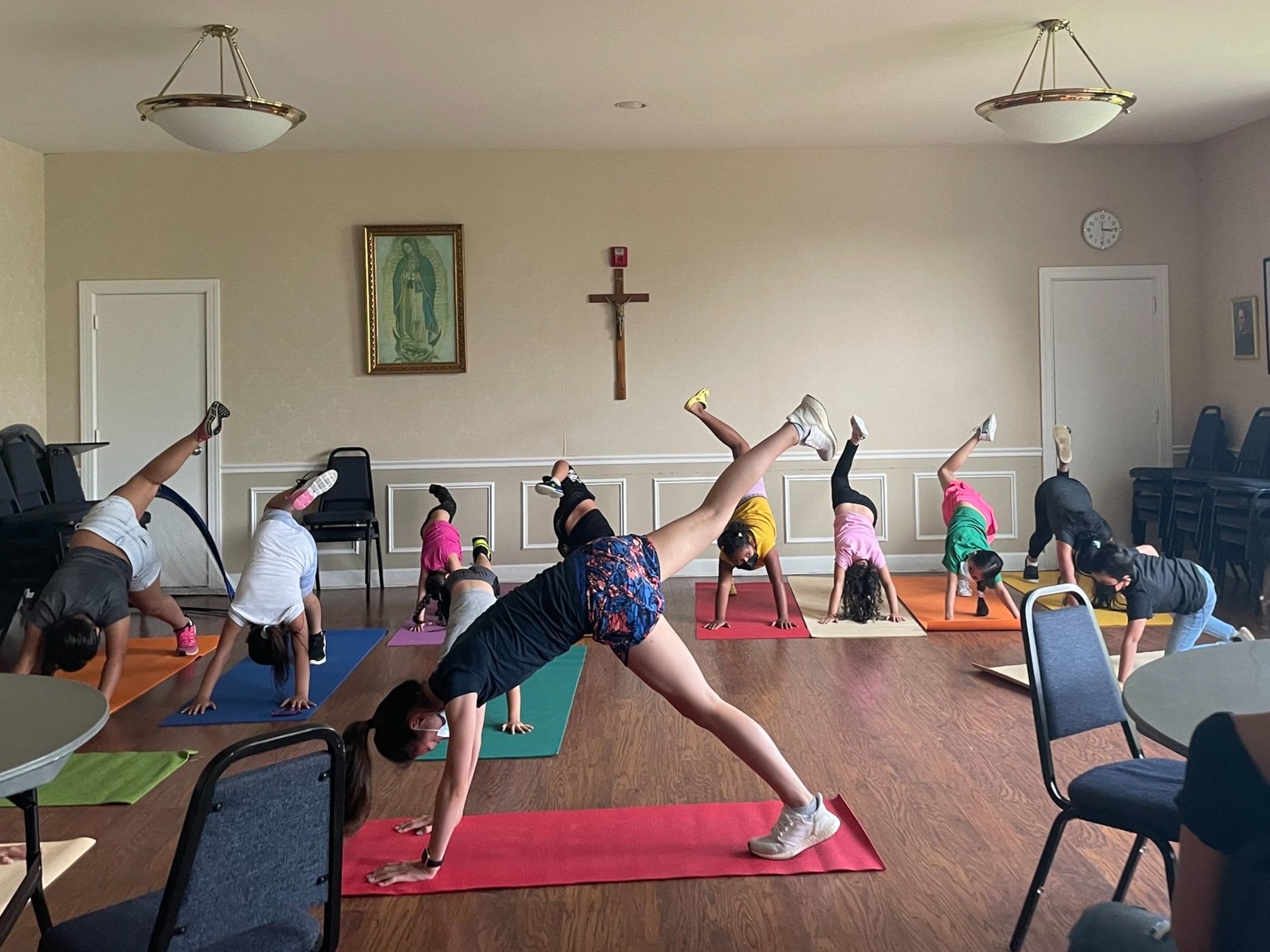 A yoga session, led by one of our highschool volunteers. Yoga is intended to reduce stress levels.