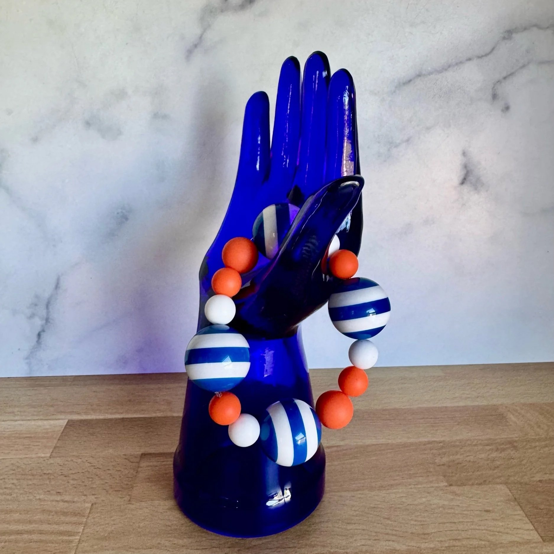 orange and blue stretchy bracelet NY team colors