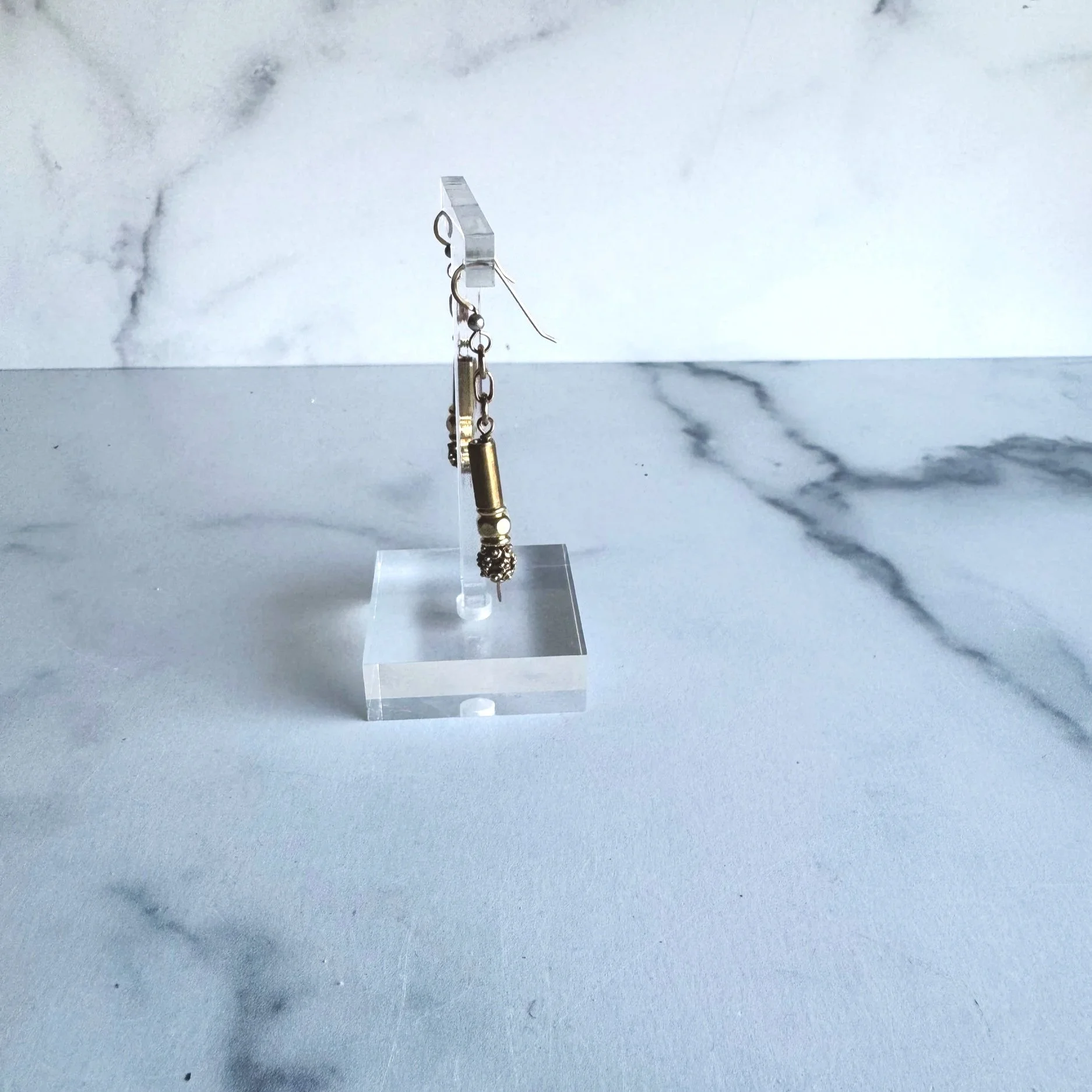 Gold earrings made from broken jewelry sustainable