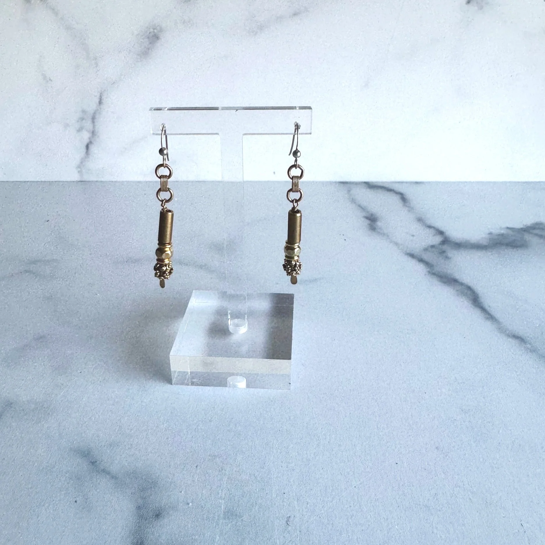 Gold earrings made from broken jewelry sustainable