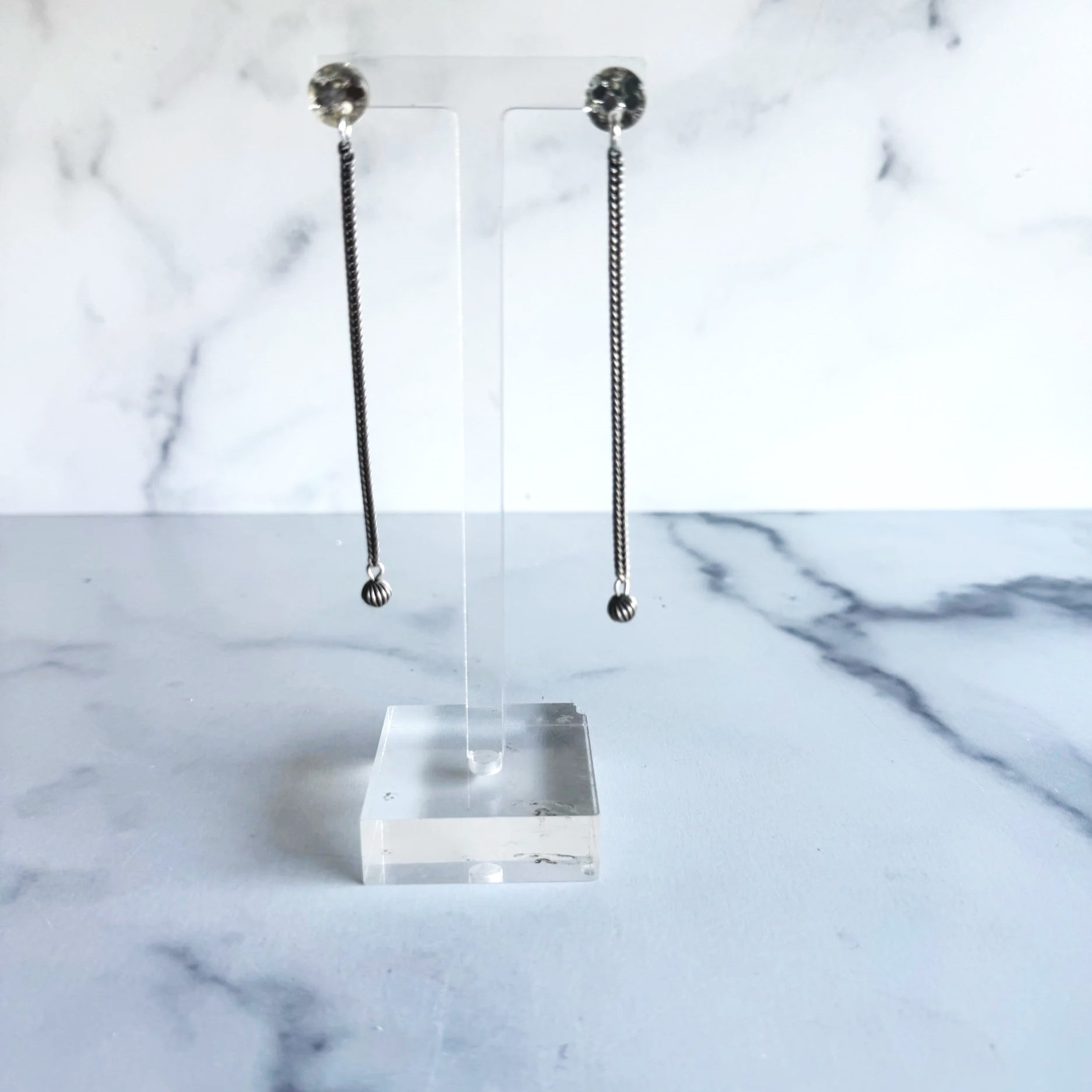 Silver drop earrings.  simple and modern