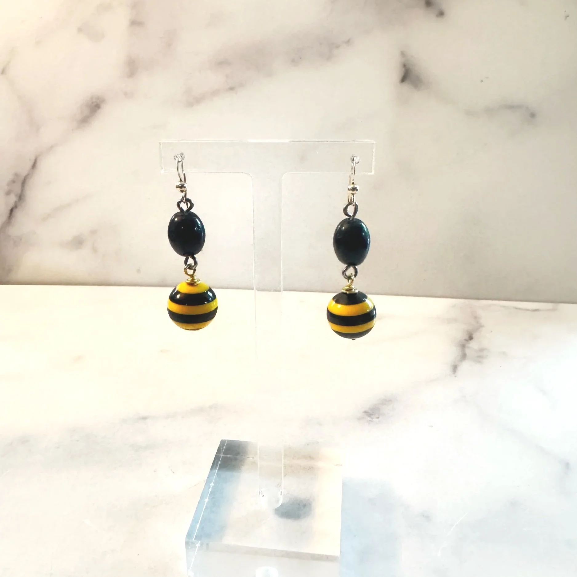 black and yellow team pride jewelry for college or professional