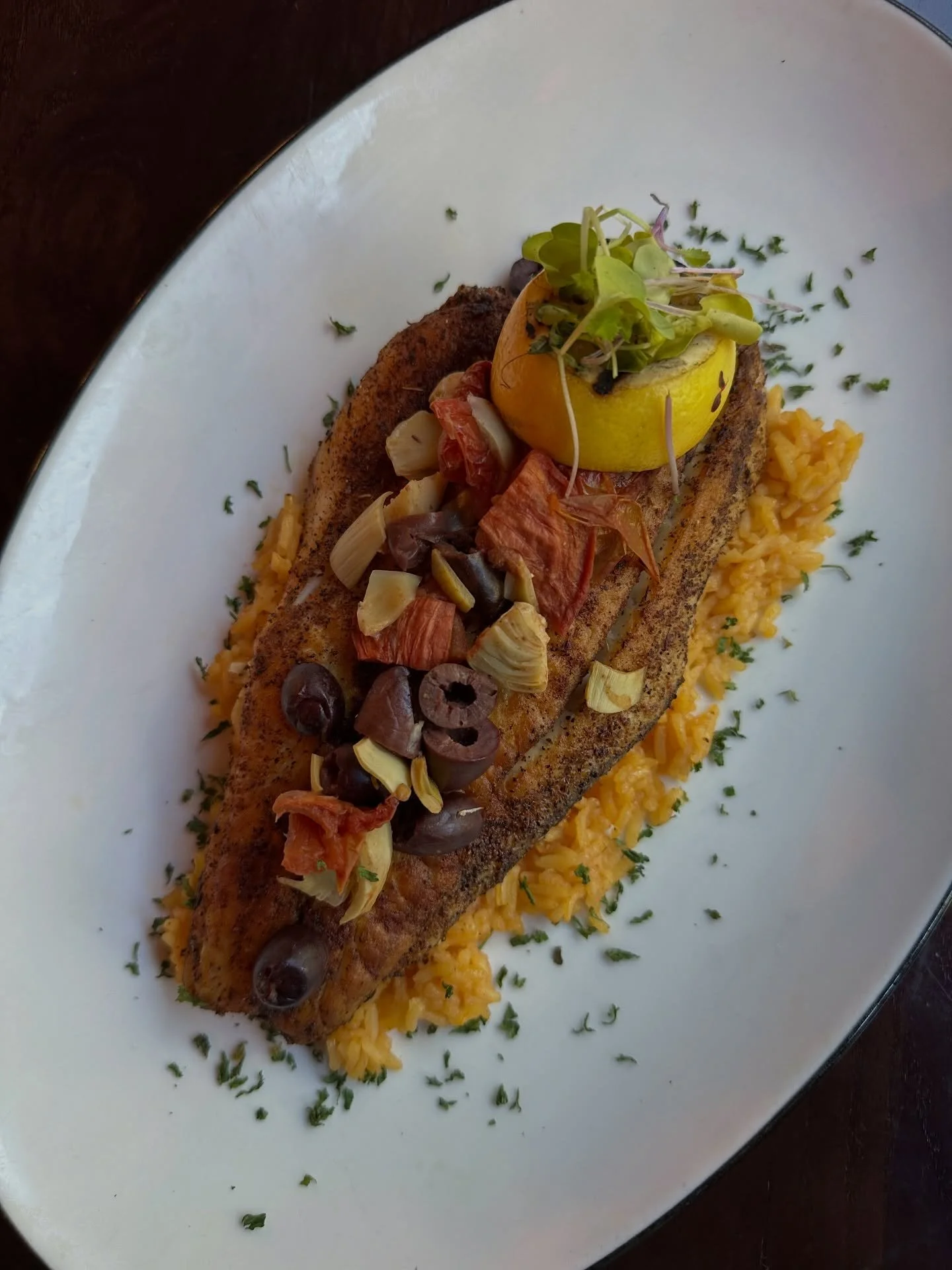 On our Features Menu for a limited time&hellip;

Blackened Barramundi on top of a bed of Spanish rice topped with a Mediterranean Caponata. 

Try it before it&rsquo;s gone!