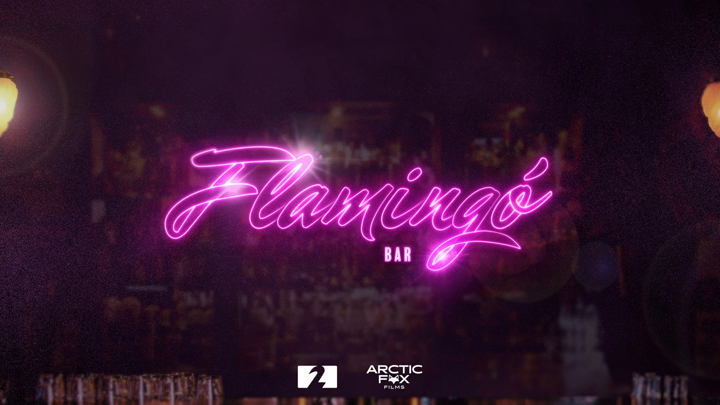 Neon sign that reads 'Flamingo Bar' in bright pink cursive letters, with a dark background and faint outlines of a bar in the background.