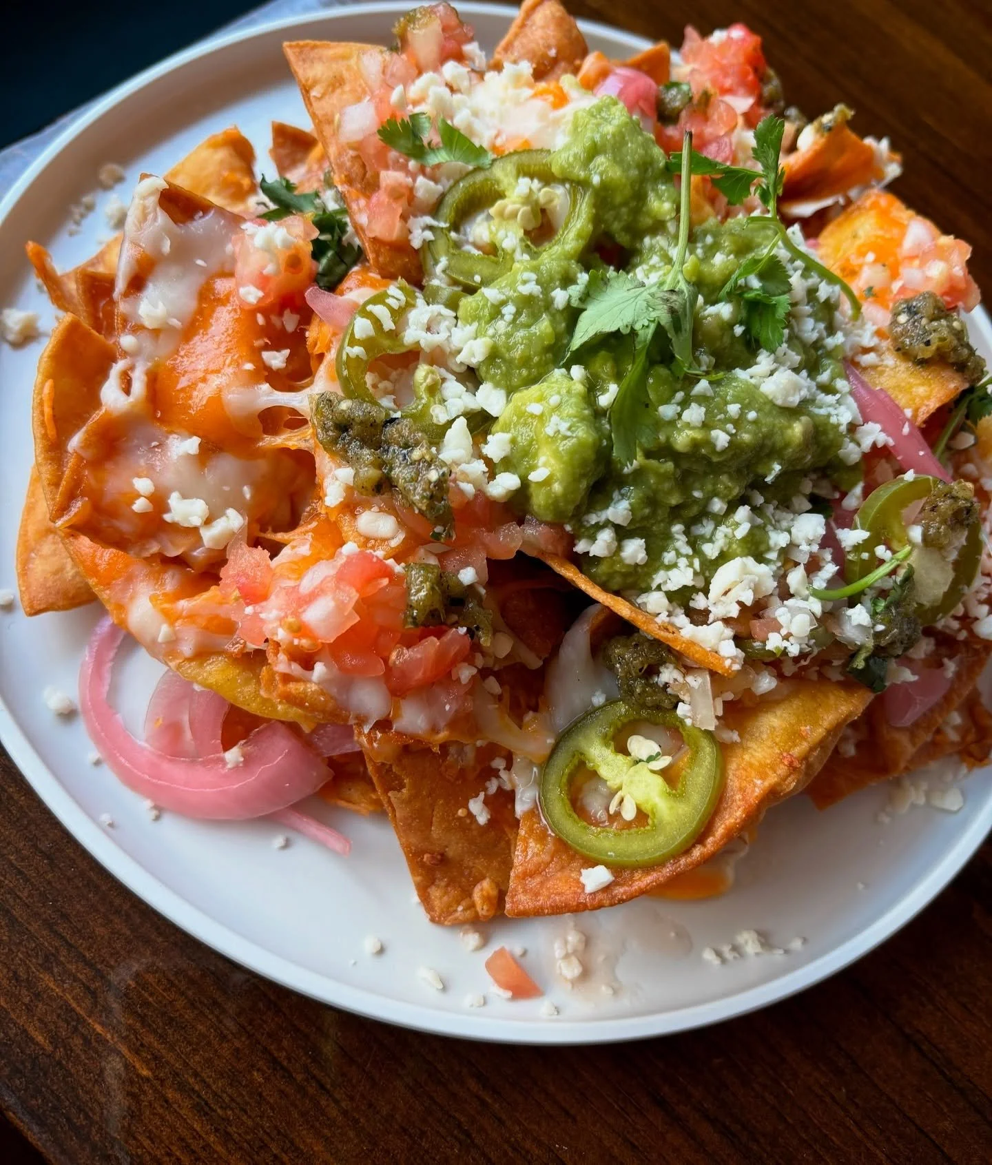 Because every table needs a little something to snack on ☺️

Our Nachitos are the perfect side: house-fried chips loaded with cheese, beans, pico, guac, jalape&ntilde;os &amp; all the good stuff.
Great for sharing&hellip; or not. 😉
#chadwicksTO #nac