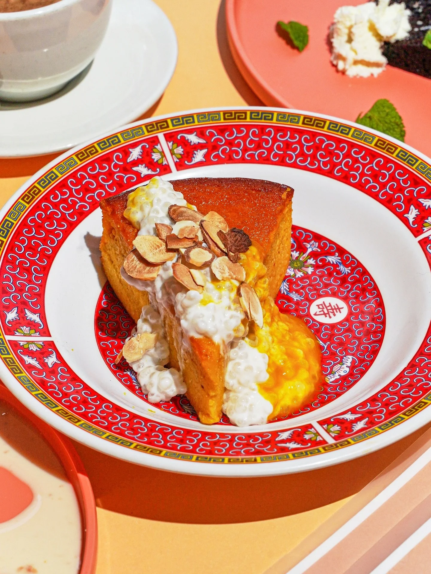 Light, bright, and just sweet enough 🍊✨
Our Mandarin Almond Cake is made with mandarin pur&eacute;e and almond flour, topped with coconut-milk sago, mango pur&eacute;e, and toasted almonds.
Gluten-free, dairy-free, and seriously lovely.