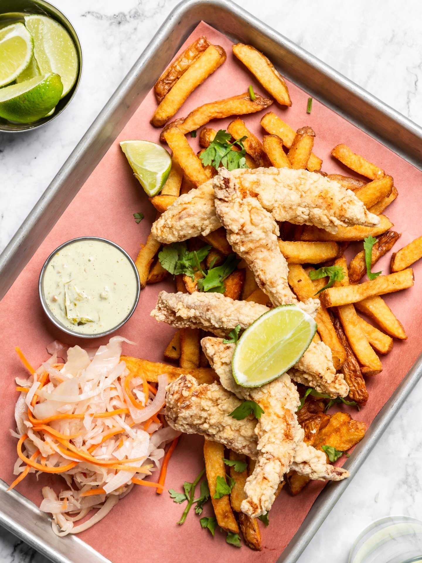 Fish and chips&hellip; but make it fancy.

Our Fish Frito is crispy Peruvian-style tilapia topped with bright red onion salad, served with aji amarillo tartar sauce and fries.

Gluten-free, golden, and seriously good. 🐟✨
#chadwicksTO