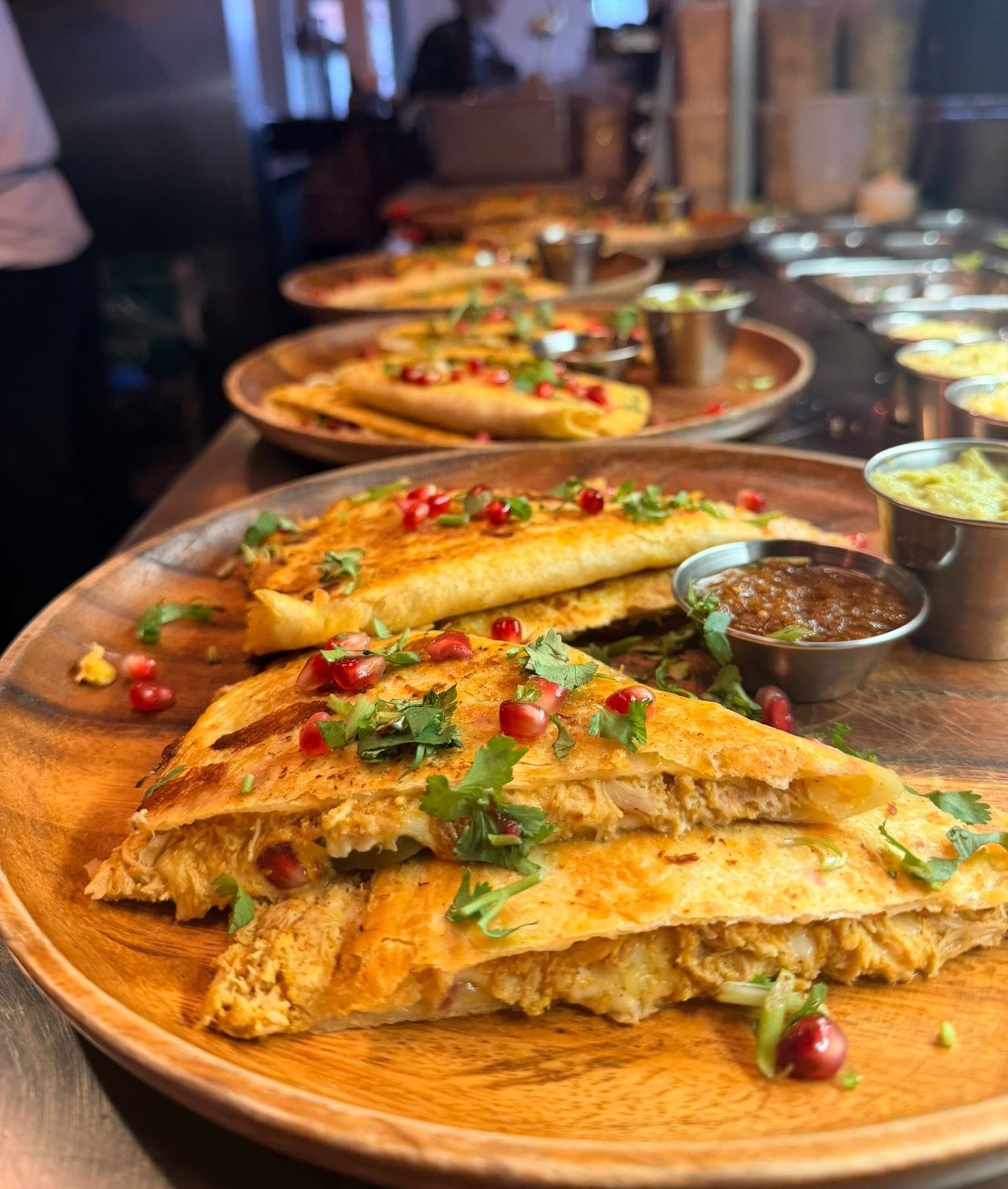 ACHIOTE CHICKEN QUESADILLA 
Achiote chicken, mango salsa, pomegranate seeds, pickled jalape&ntilde;os, oaxaca and cotija cheese in a wheat tortilla served with guacamole and chile de arbol sauce - 22.00
#chadwicksTO