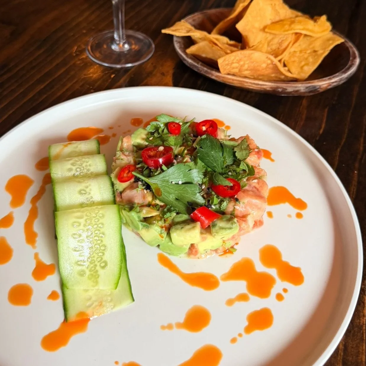 This week 👉 Yuzu Arctic Char Ceviche 🐟

Fresh Arctic char cured in bright Japanese yuzu, lightly dressed with sesame oil, and tossed with pico de gallo, diced avocado, and crisp cucumber. Finished with sesame seeds, pickled Anaheim chilies, parsley