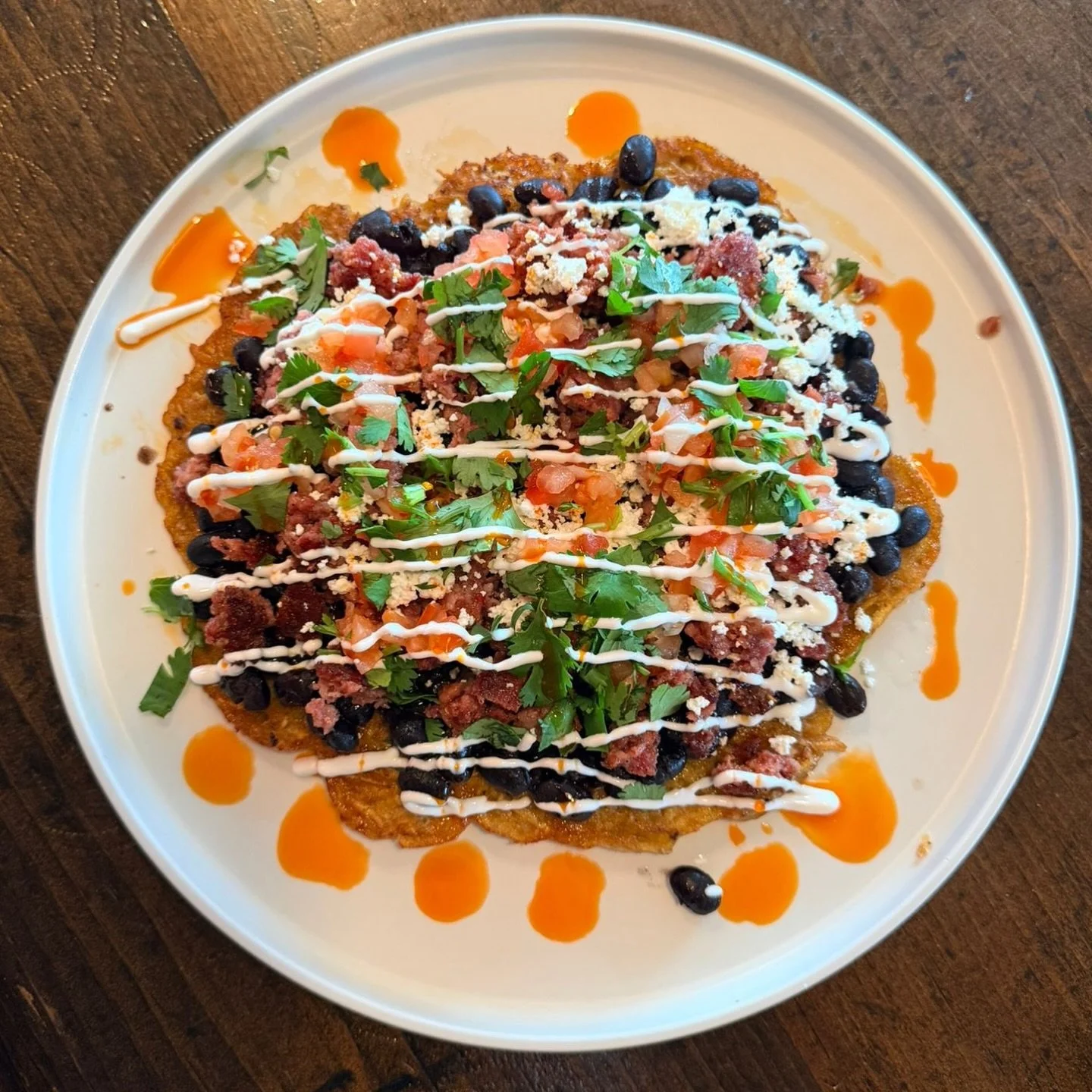 Brunch Special: Tosta de Platano 🍌 

Golden, crispy plantain at the base, then comes the richness: slow-baked beans, savoury Szechuan sausage, and salty crumbles of cotija.

Finished with fresh pico, herbs, crema, and a little heat from chilli oil ?