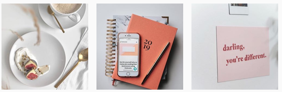 A mobile phone on top of a diary and planner