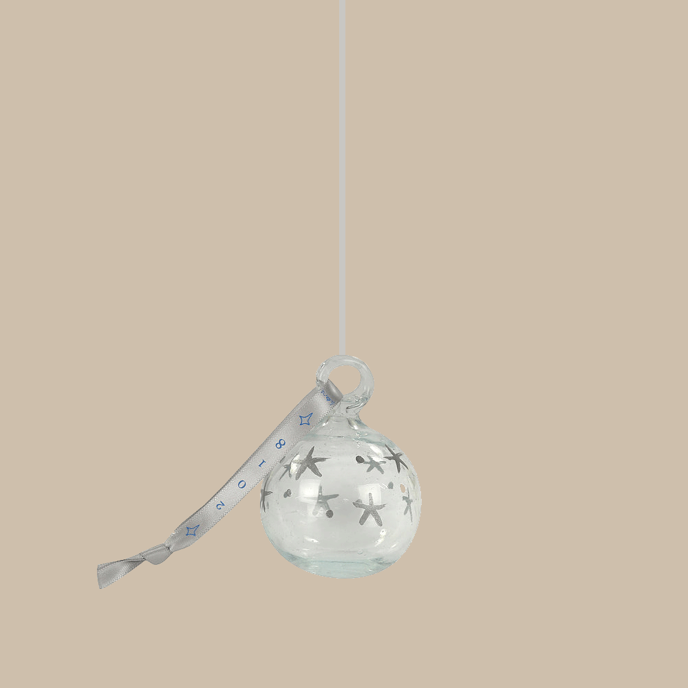 Gif of a swinging Christmas tree bauble