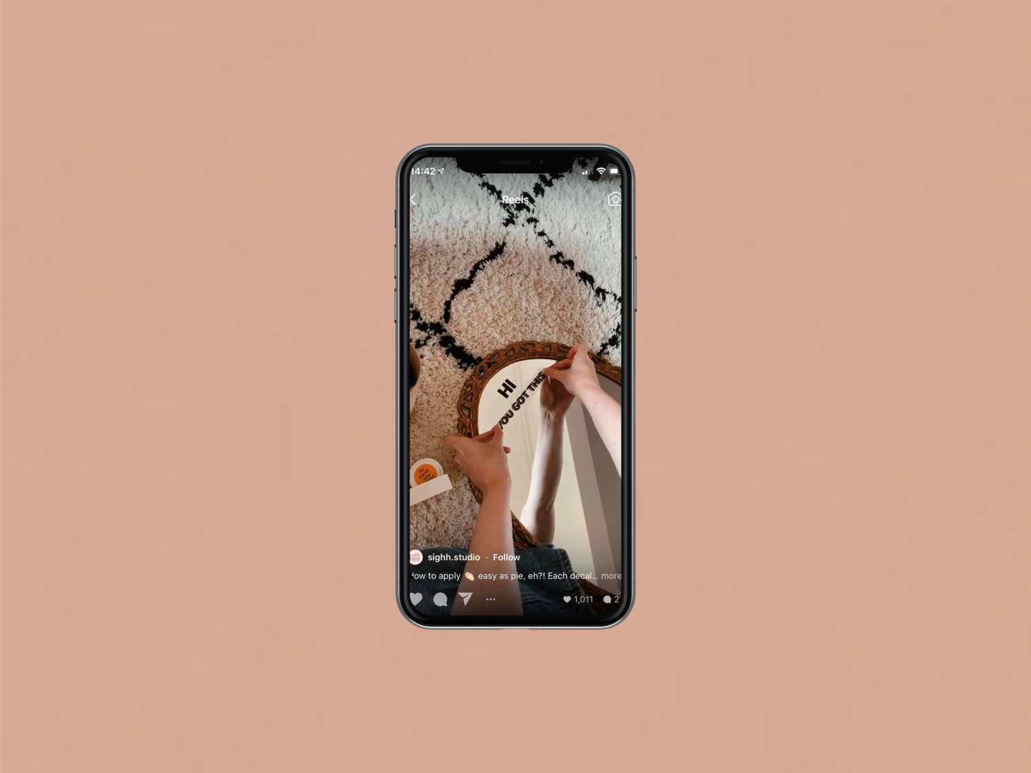 A mobile phone with a still from Tik Tok