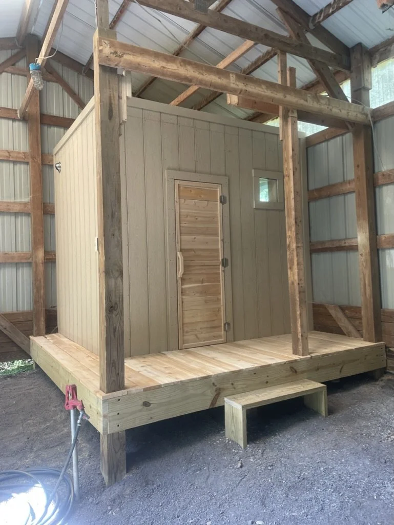 Barn sauna with cedar door