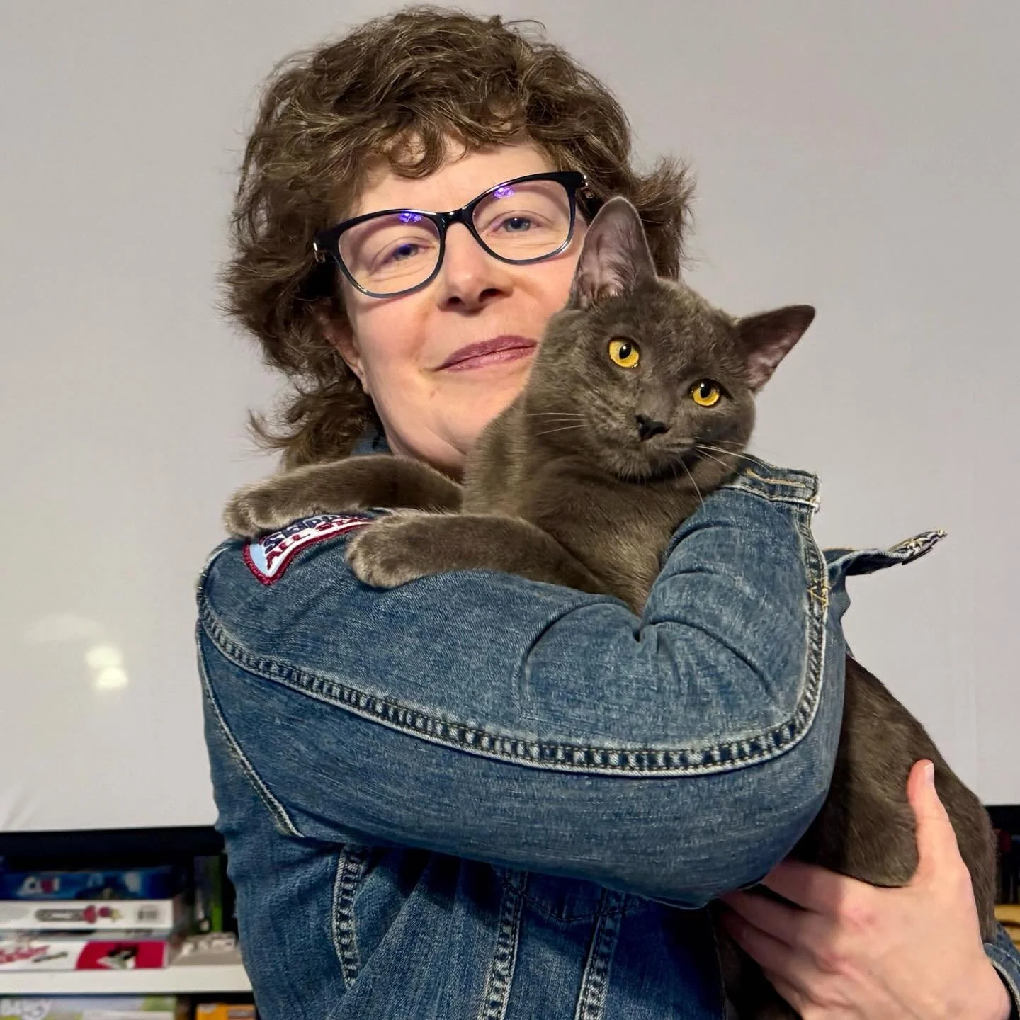 Spice, a beautiful grey young man, has found his forever home with Eva in Ellensburg.  It was a perfect match - Eva has a dream home for cats and two older feline brothers for Spice. Spice and Eva immediately hit it off as you can see, and we have no