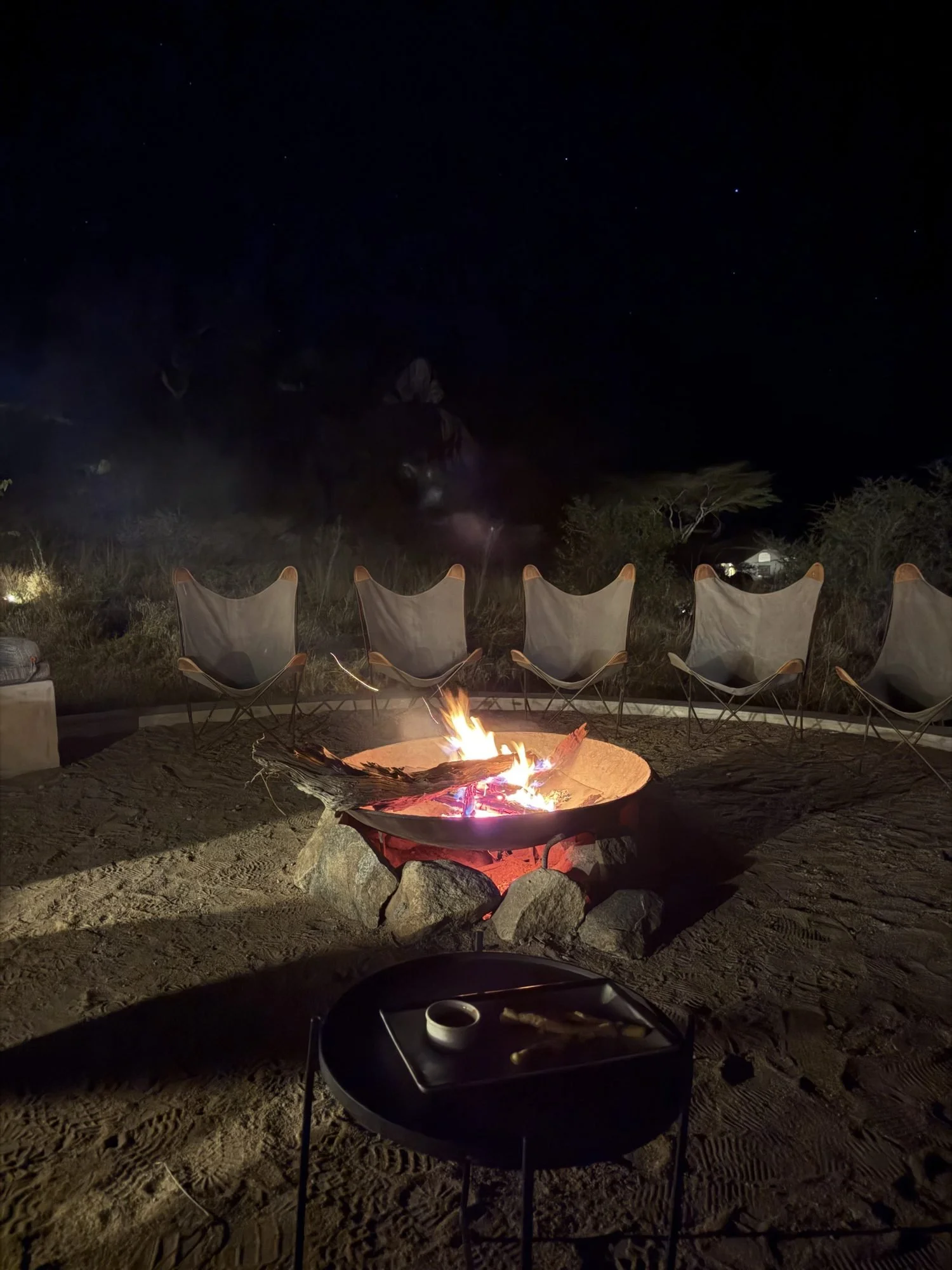 Fire burning in the Lemala Nanyukie fire pit before dinner