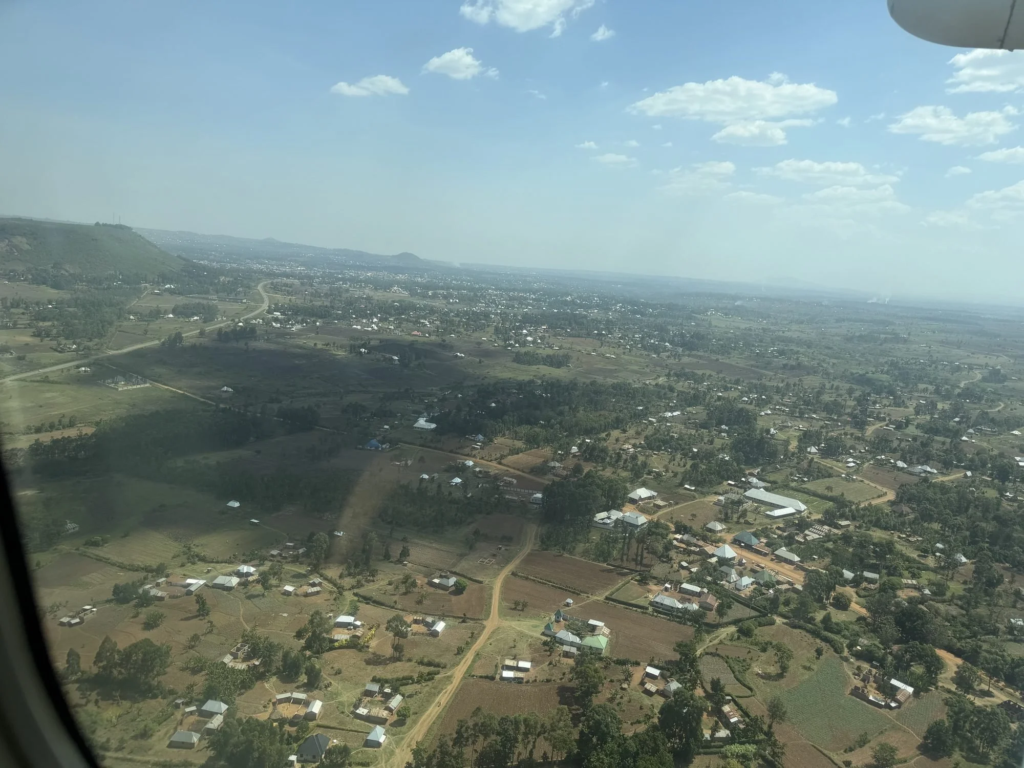 Farmland and villages seen from a light aircraft on the way to the Serengeti and Lemala Nanyukie