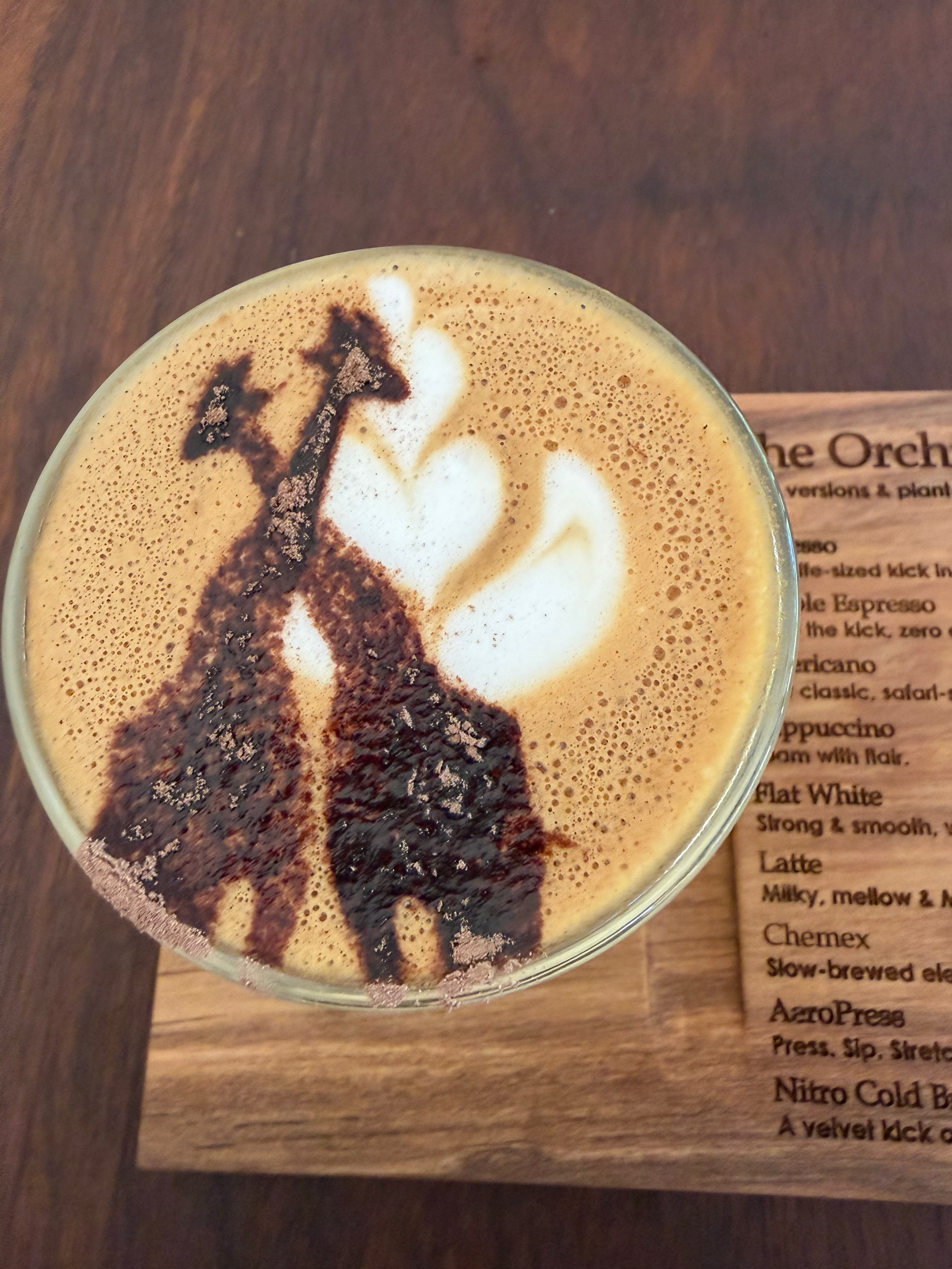 two giraffes in a coffee