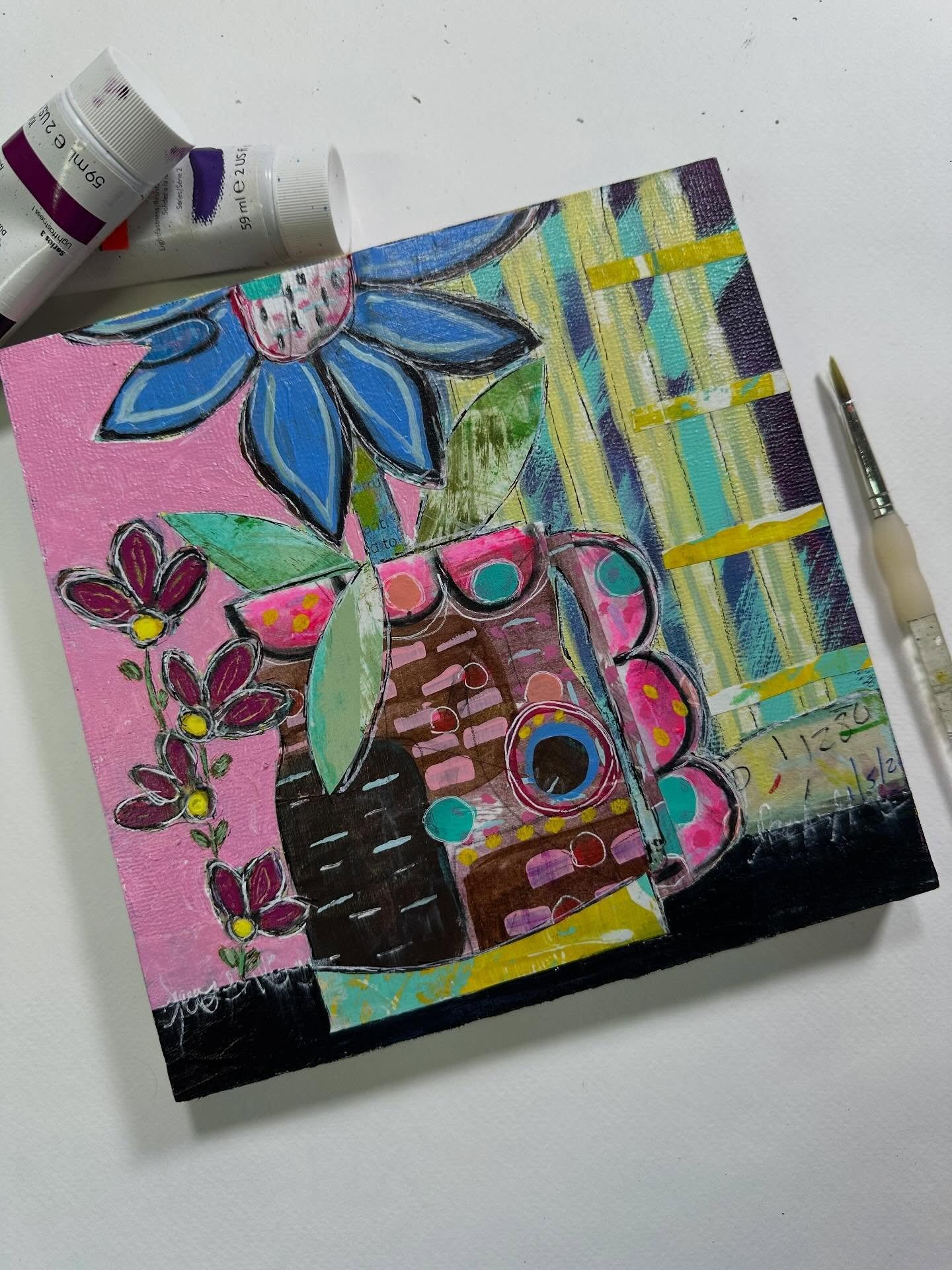 Acrylics on wood panel canvas. I cleaned my paintbrush off on printer paper then doodled all over it. I cut out the shapes I liked and glued them to the canvas. Then, I added details. 

#mixedmediart #useyourscraps #acrylicsoncanvas #mixedmediacanvas