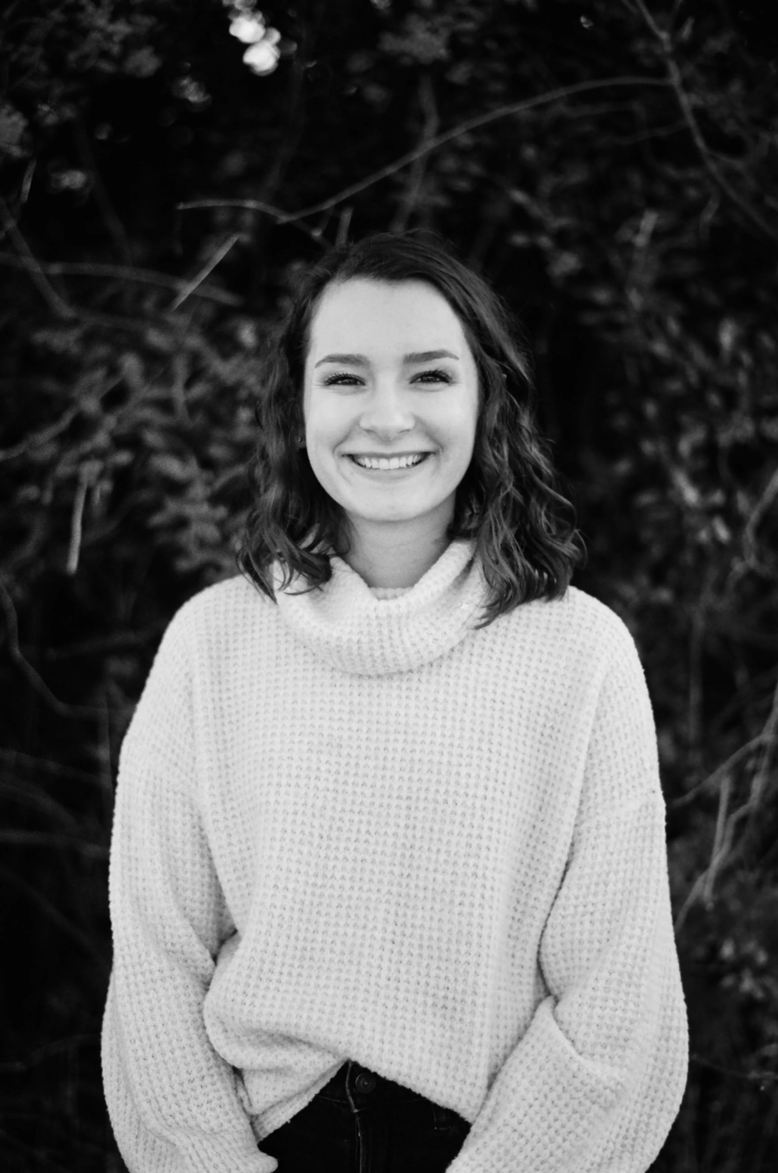 A black and white photo of Kayla Patterson