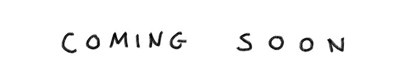 handwritten text that reads "coming soon"