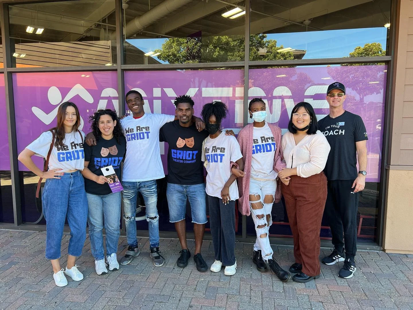 Two Good Stuff team members volunteering with Griot Theater Company