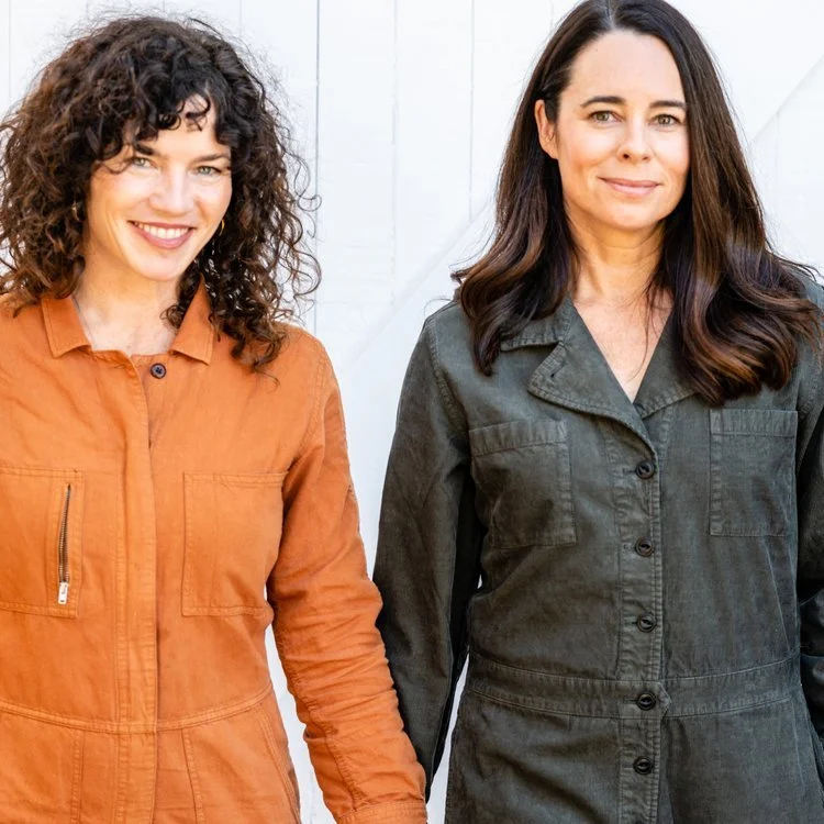 Two women smiling