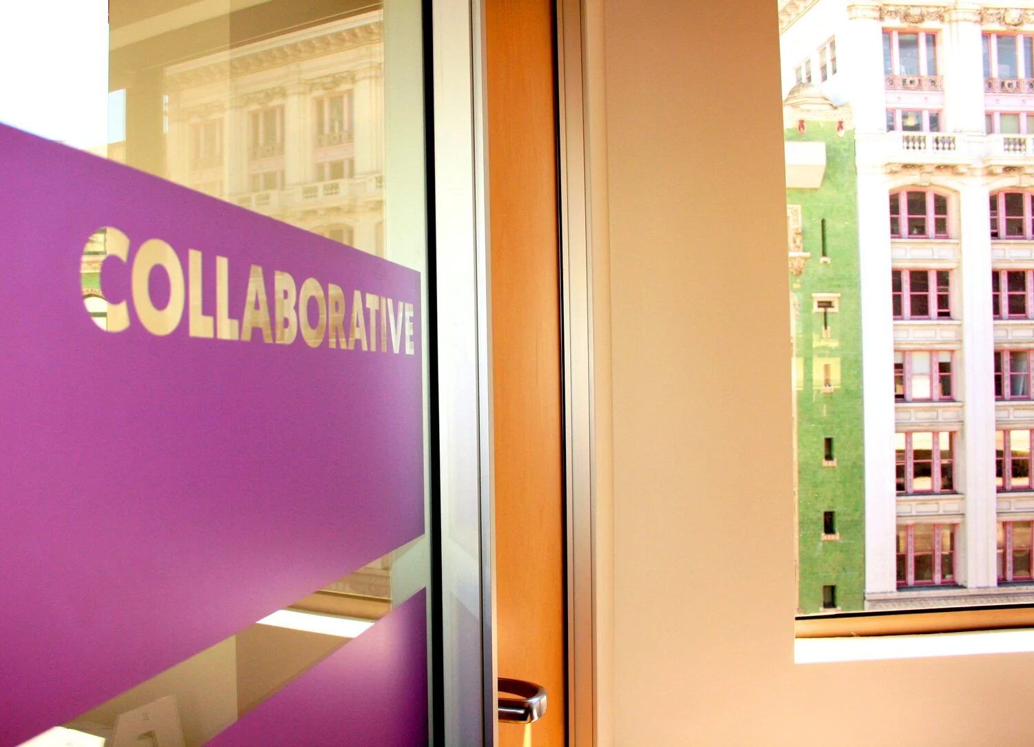 Global Fund for Women office branding "COLLABORATIVE" window cling